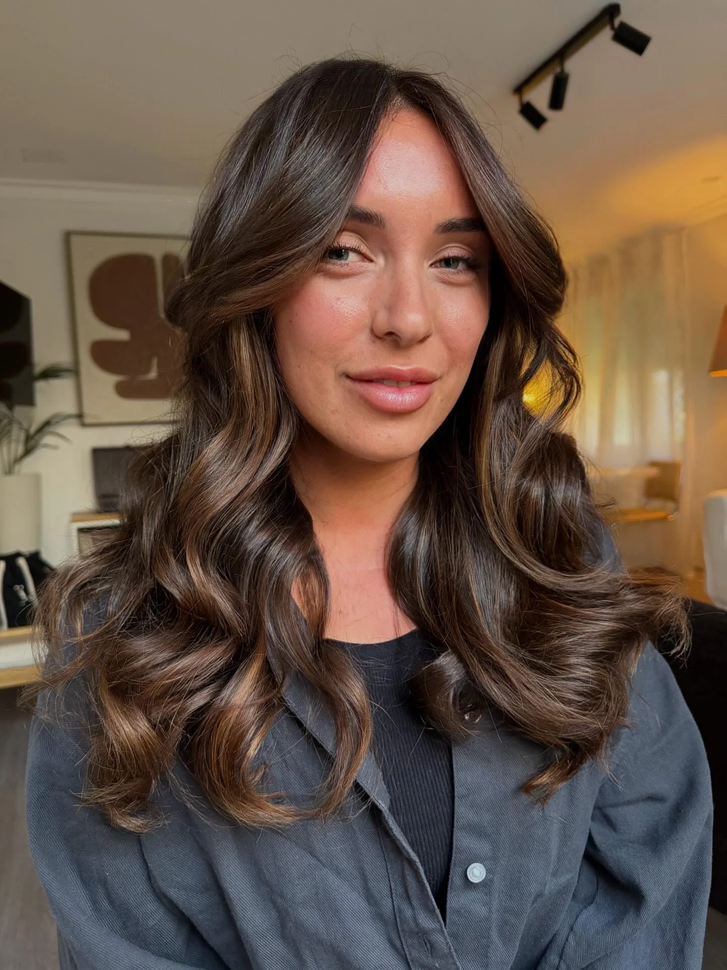 hair lowlights: color ideas and inspiration Glossy Espresso Lowlights With Effortless Movement