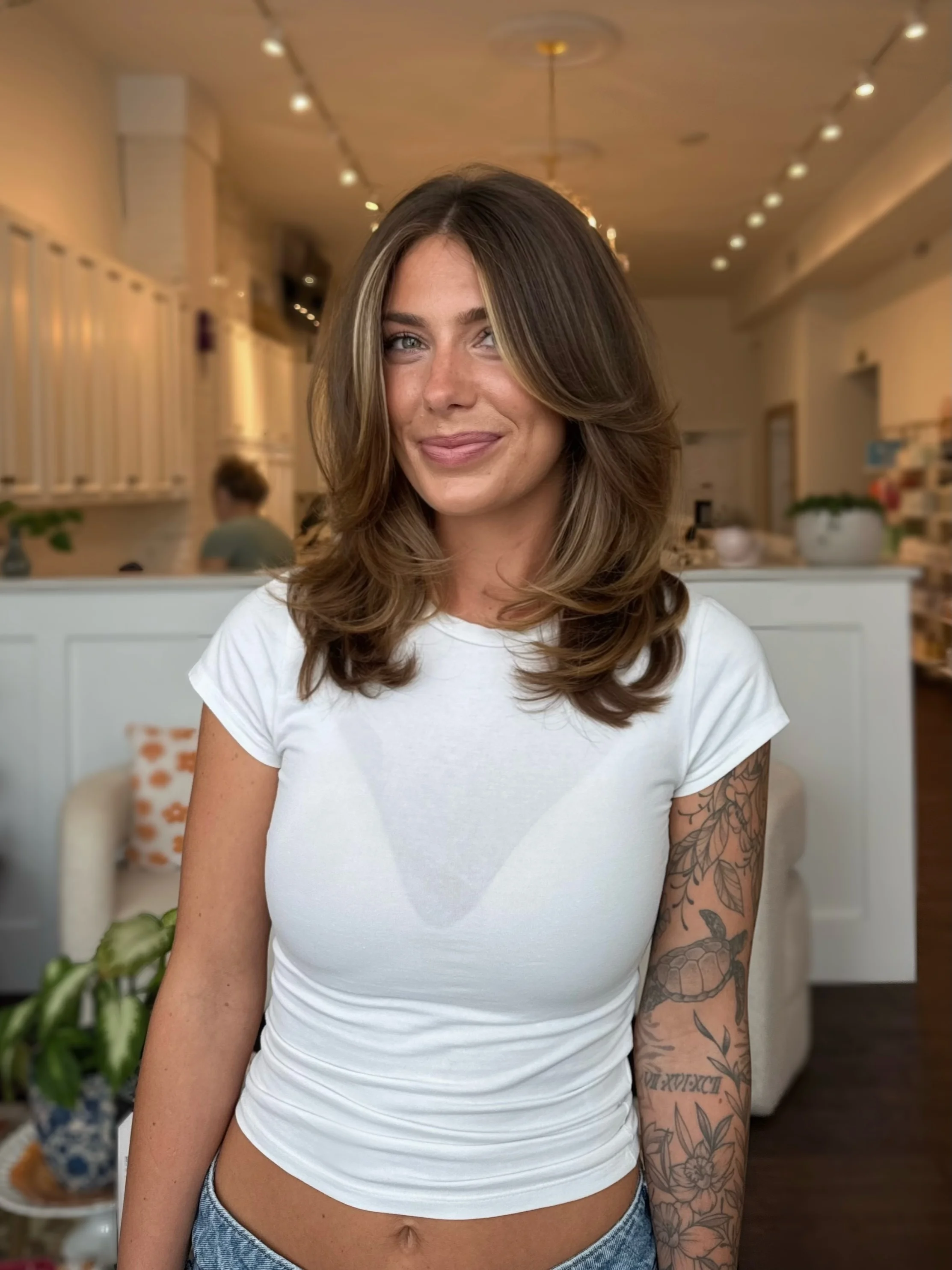 choppy medium layered hair Dimensional Brunette Layers With Soft Money Piece Highlights