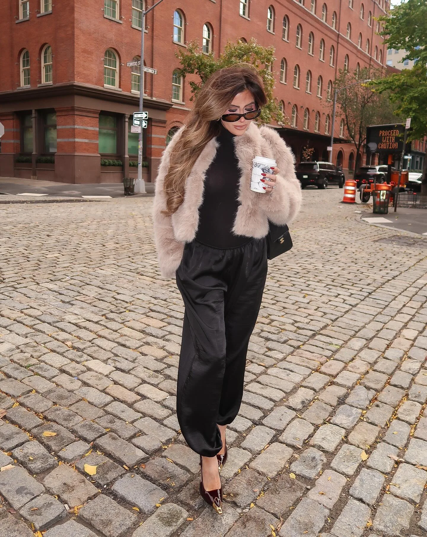 glamorous fall outfits 2026 Soft Faux Fur And Fluid Black Trousers For Elevated Everyday Style