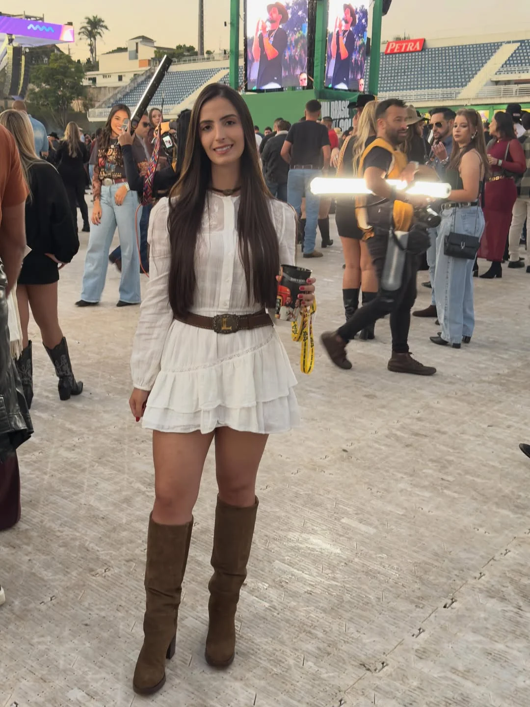 fall concert outfits 2026 Soft White Dress Styled With Tall Suede Boots