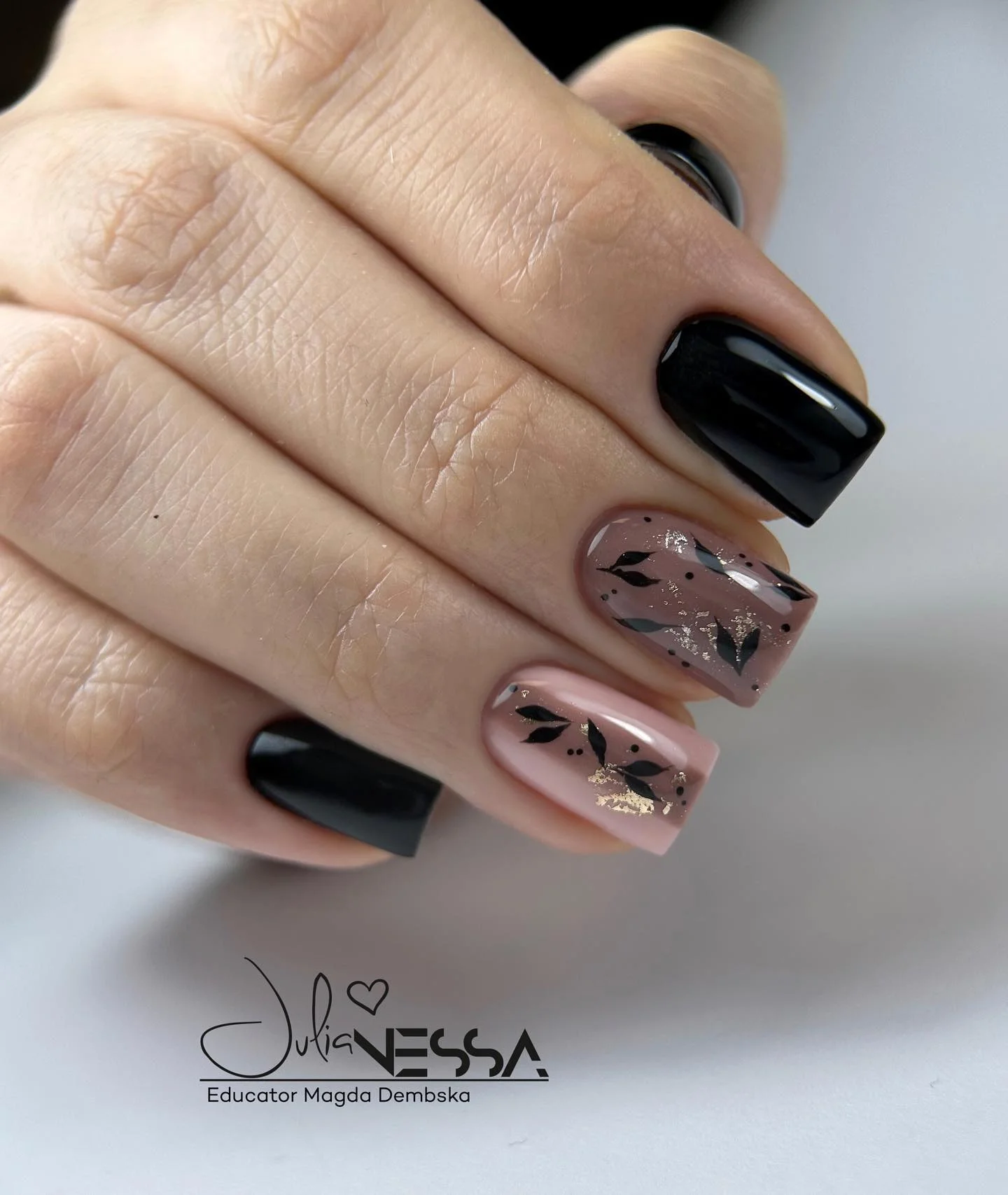 fall nail for all plates skin 2026 Black Botanical Nails With Modern Gold Details