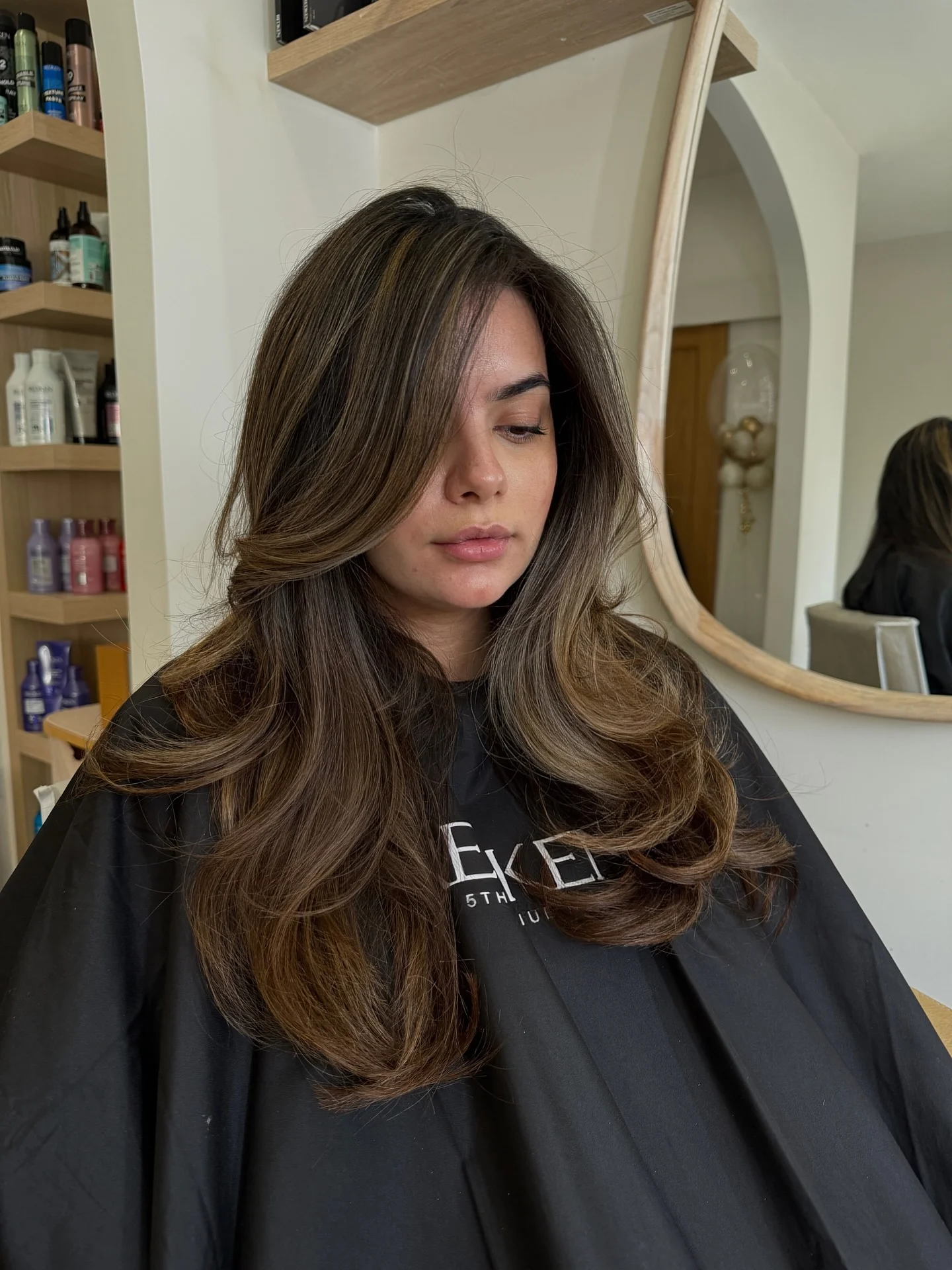 hair lowlights: color ideas and inspiration Layered Mushroom Brunette With Silky Volume