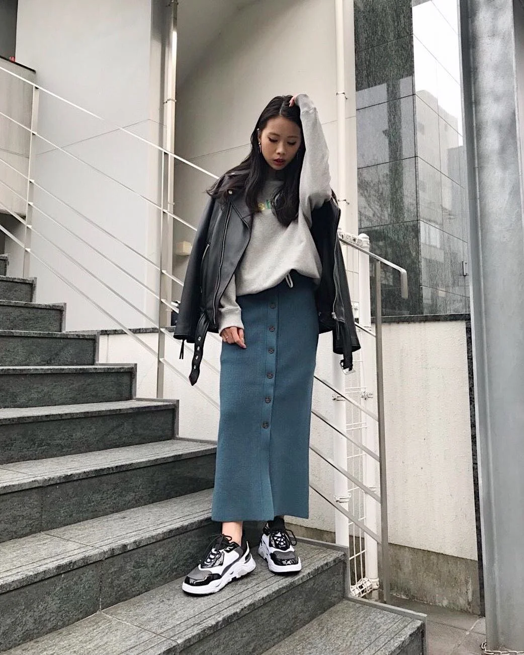 knit skirt outfits fall 2026 Blue Button Front Knit Skirt With An Oversized Leather Jacket