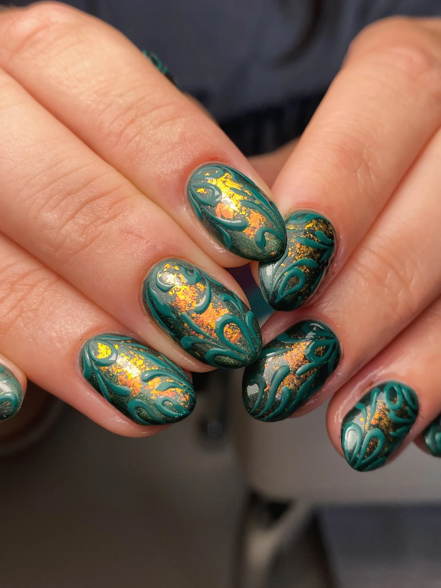 september nail art ideas 2026 Emerald Green Metallic Swirl Nails With Gold Foil