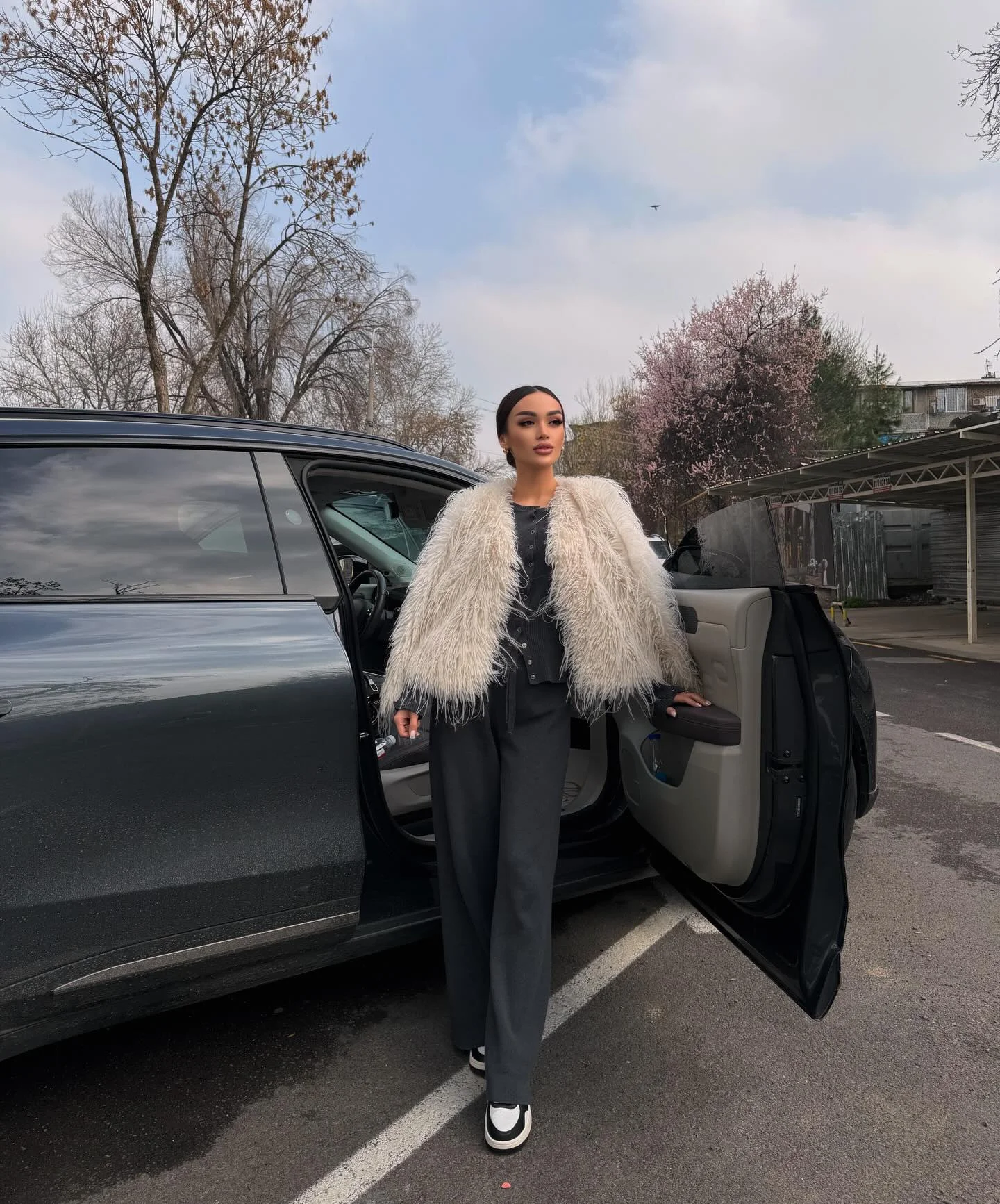 shaggy jacket Elegant Contrast With An Ivory Shaggy Jacket And Charcoal Tailoring