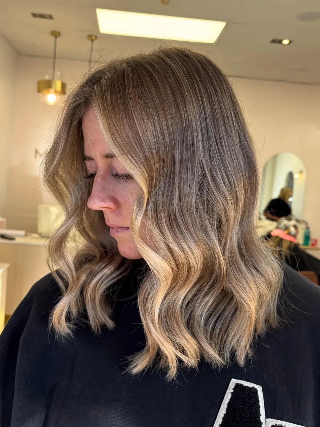 beige blond hair color Shoulder-Length Beige Blonde Waves With Airy Dimension