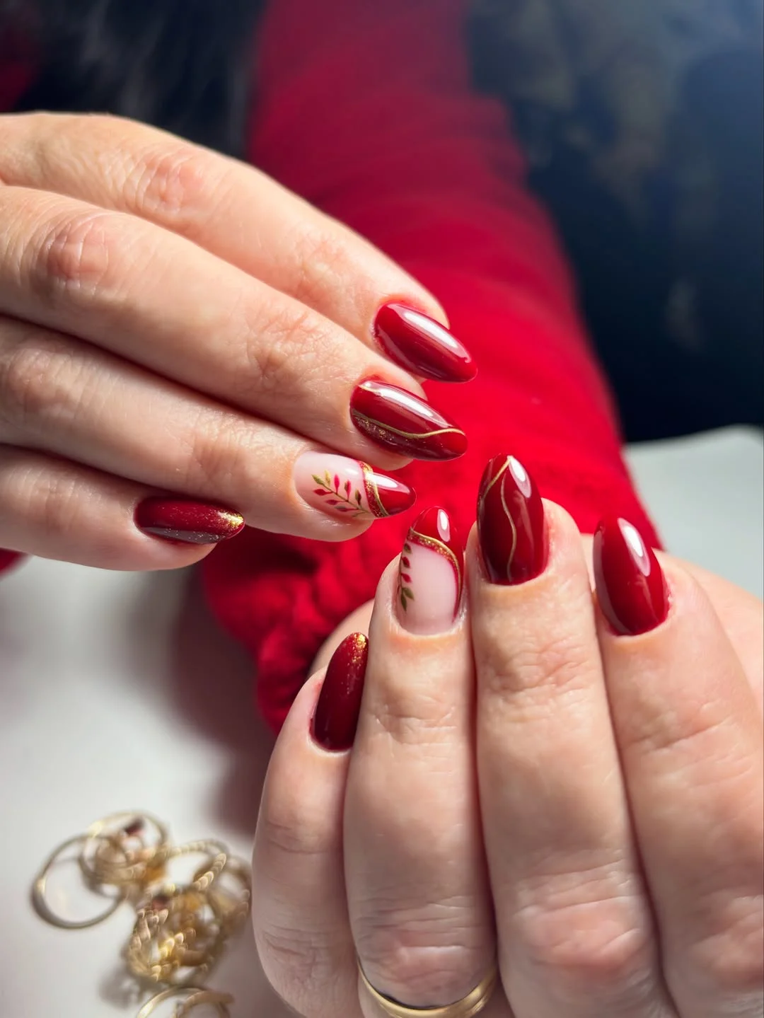 fall red nails 2026 Elegant Burgundy Botanical Nails With Gold Lines
