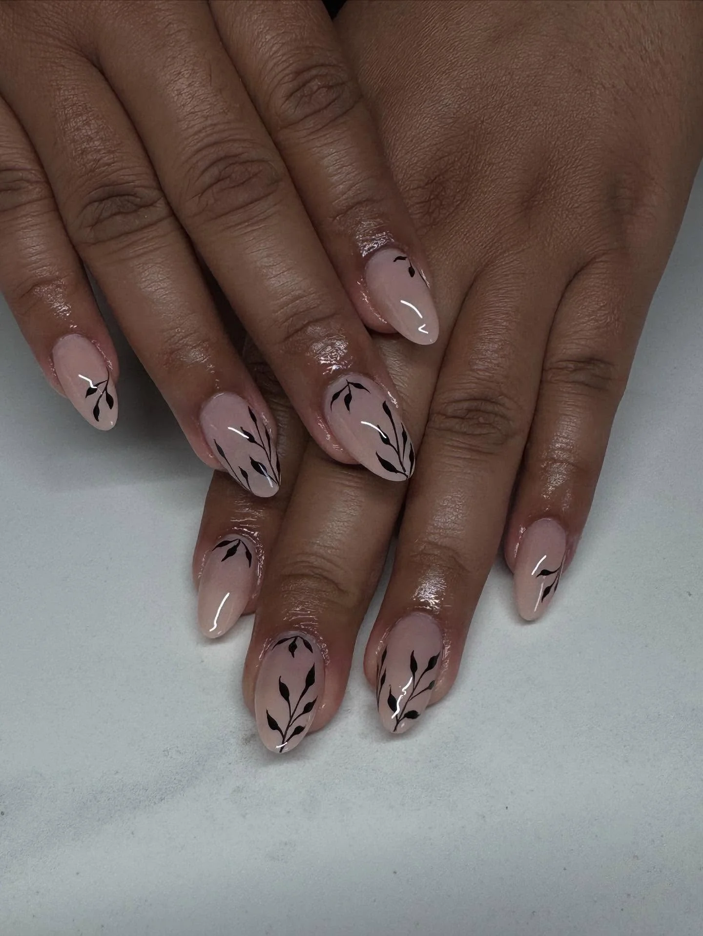 fall almond nails 2026 Minimal Nude Almond Nails With Black Botanical Art