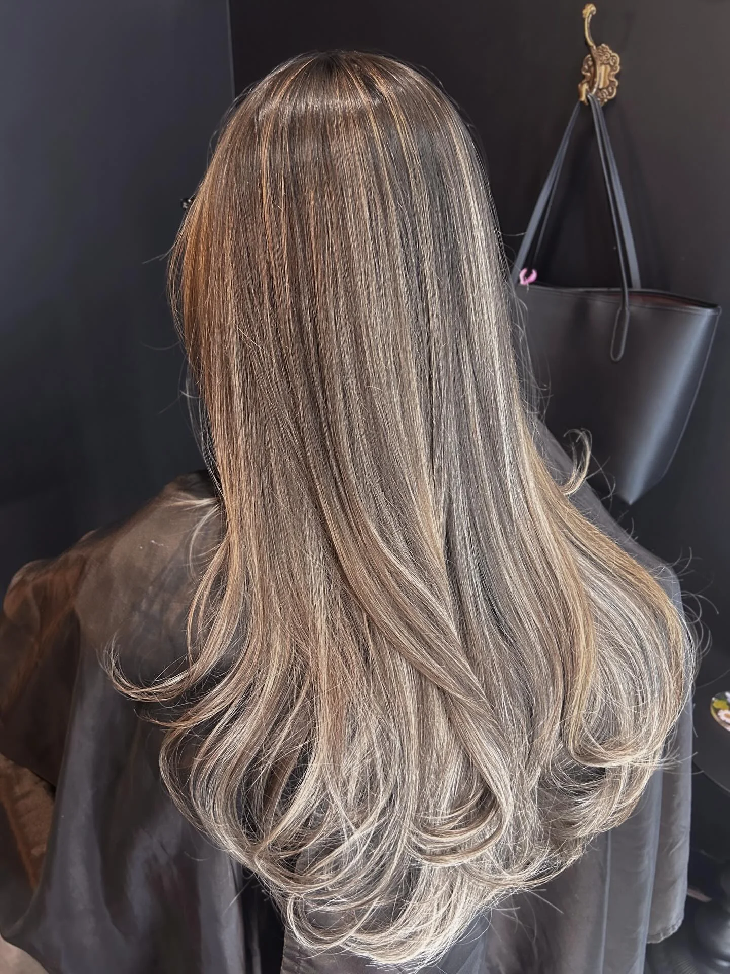 beige blond hair color Long Layered Cool Beige Blonde With Feathered Ends