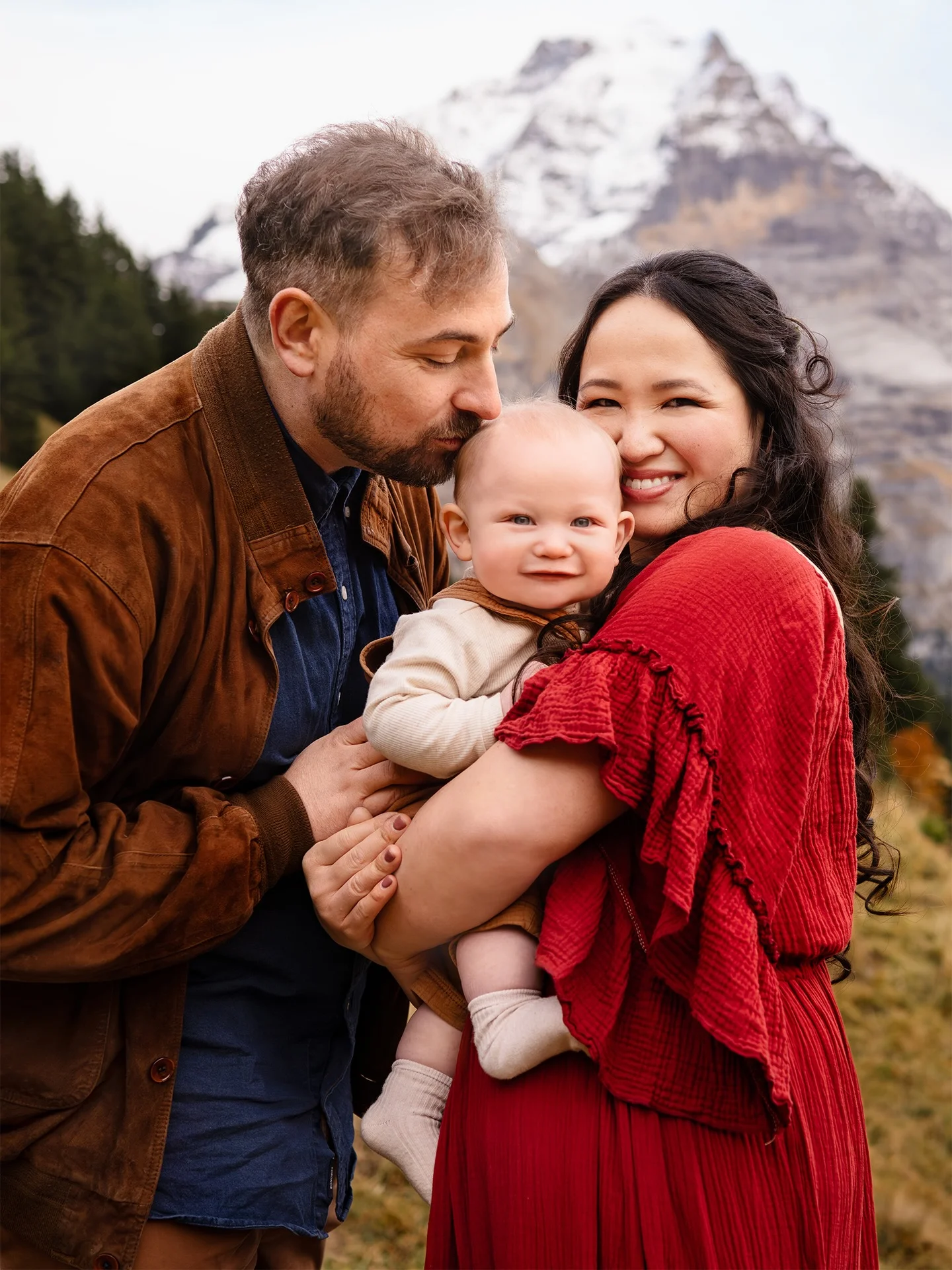 fall photoshoot outfits 2026 Rich Crimson And Brown Layers For Mountain Family Portraits