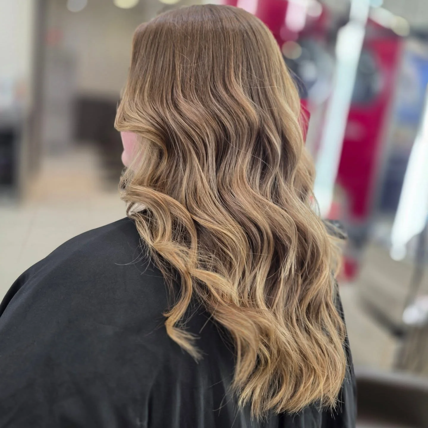 beige blond hair color Long Flowing Beige Blonde Balayage With Natural Dimension