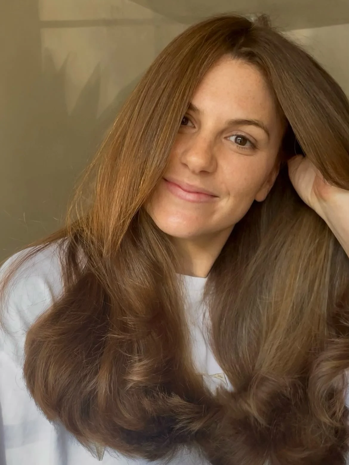 fall hair color ideas 2026 Soft Cinnamon Brown With Silky Volume