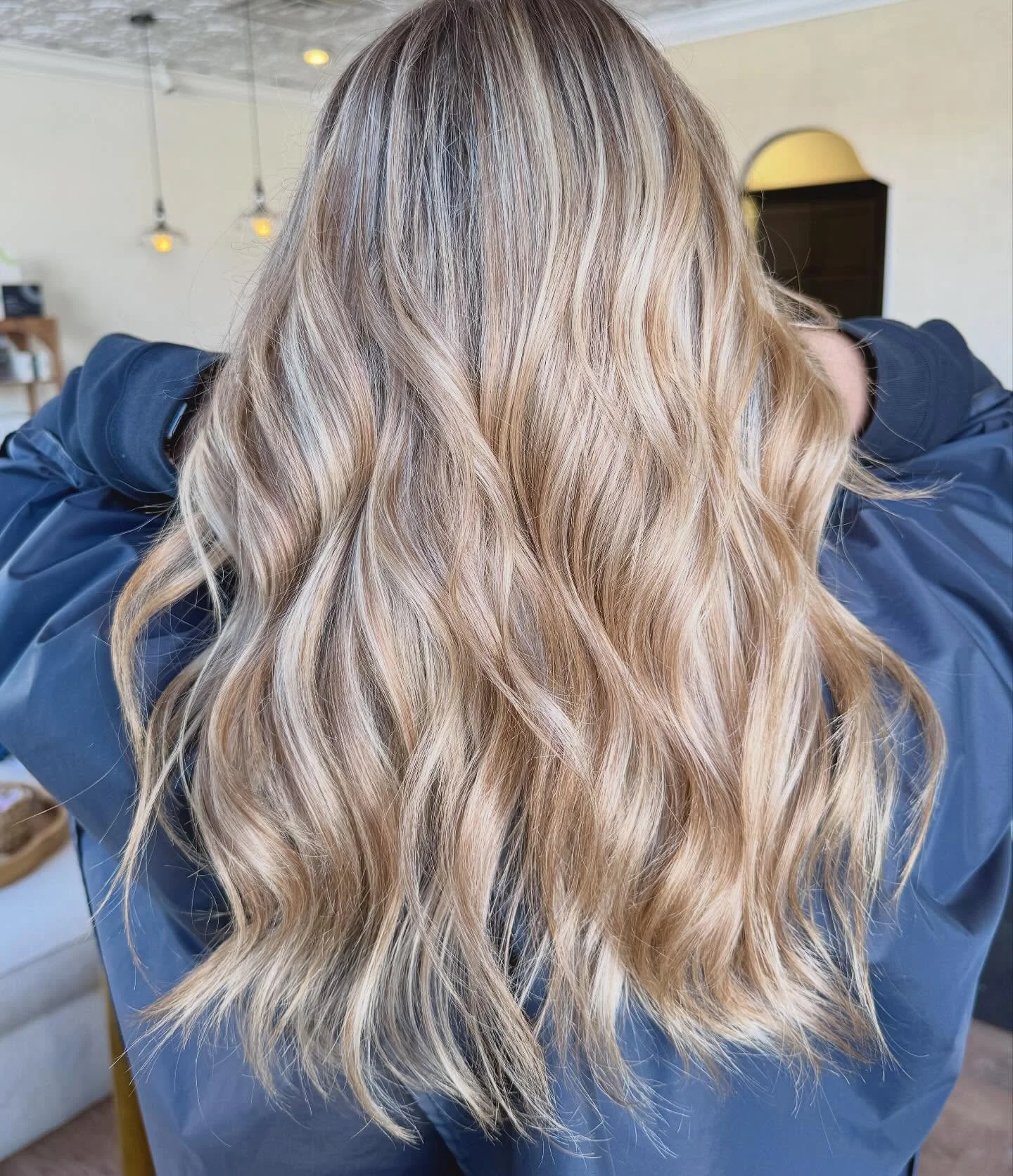 fall blonde hair color 2026 Beige Blonde Waves With Natural Shadow Root
