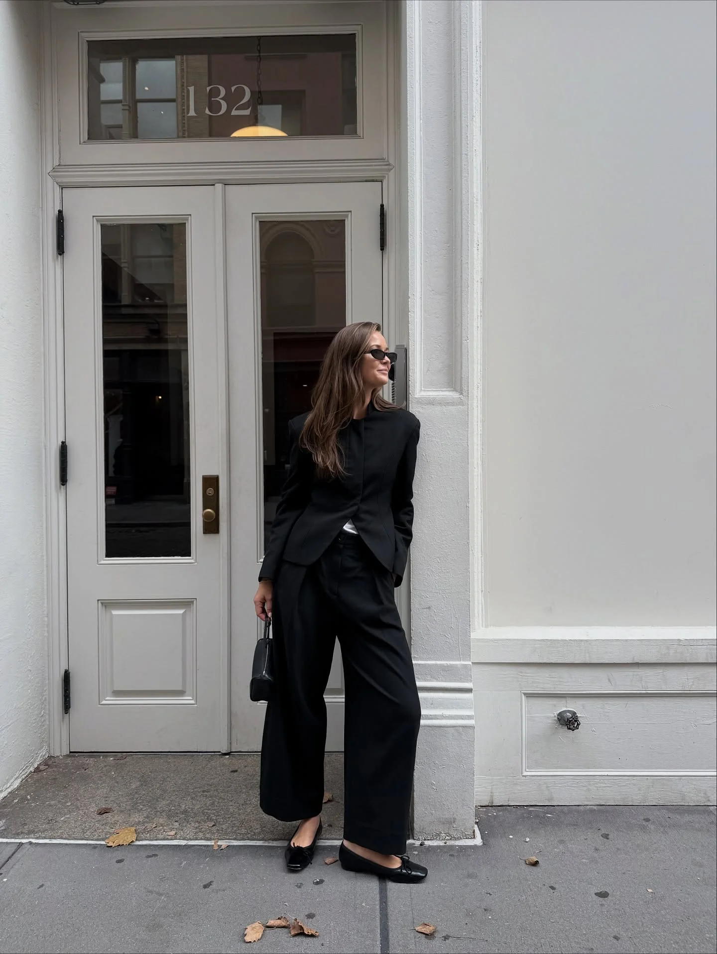 fall outfits wide leg trousers 2026 Modern Black Tailoring With Relaxed Confidence