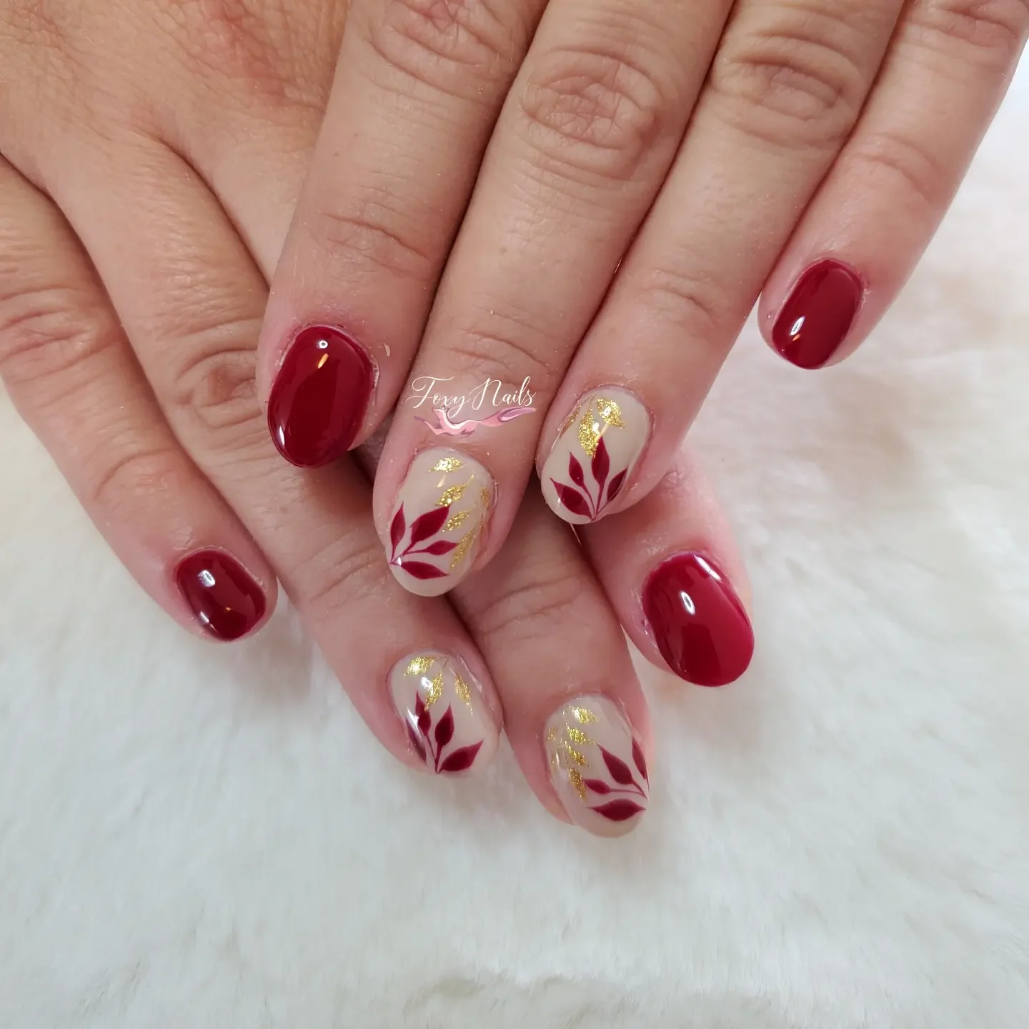 fall red nails 2026 Burgundy Botanical Nails With Luxurious Gold Accents