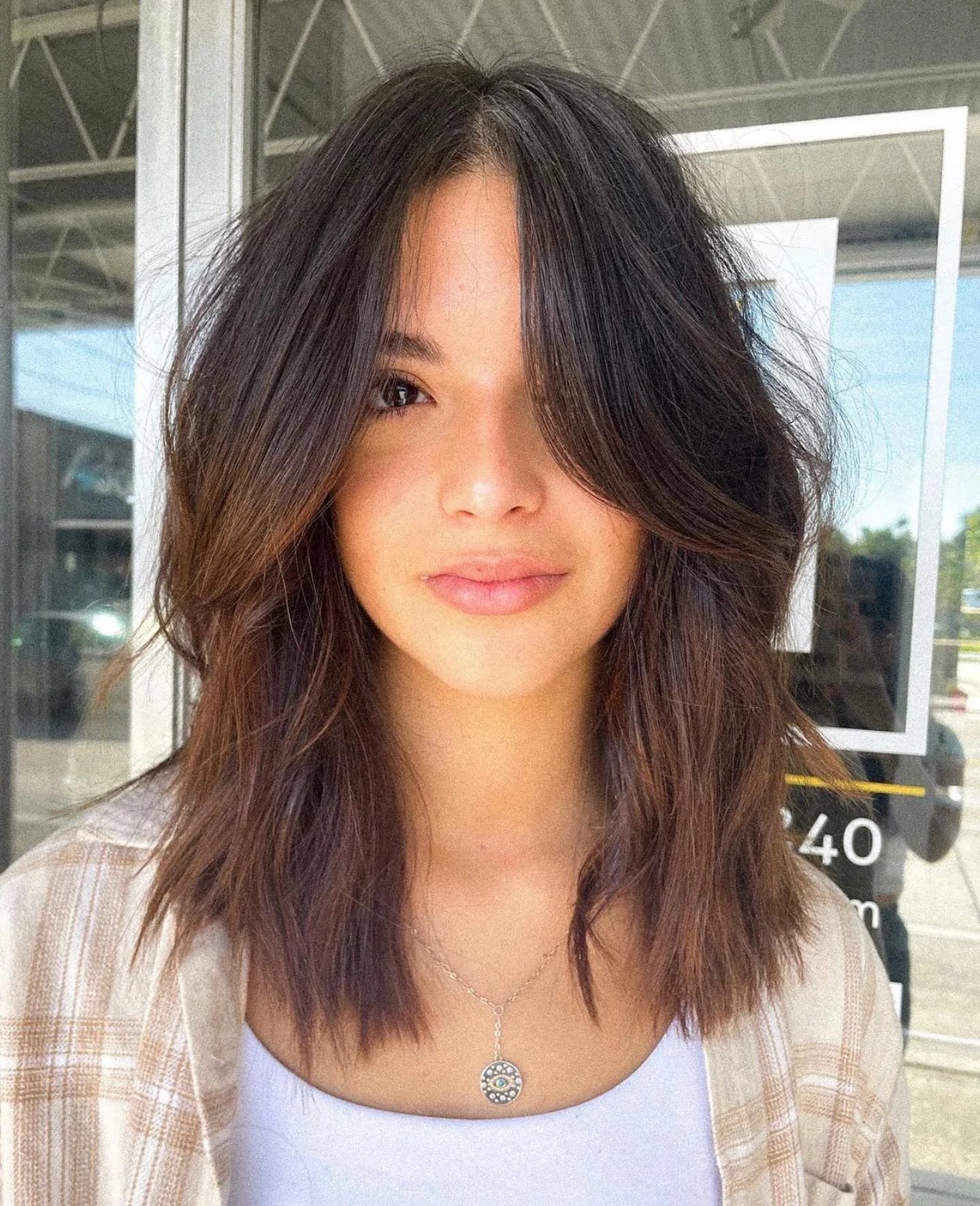choppy medium layered hair Modern Shag-Inspired Layers With Airy Curtain Fringe
