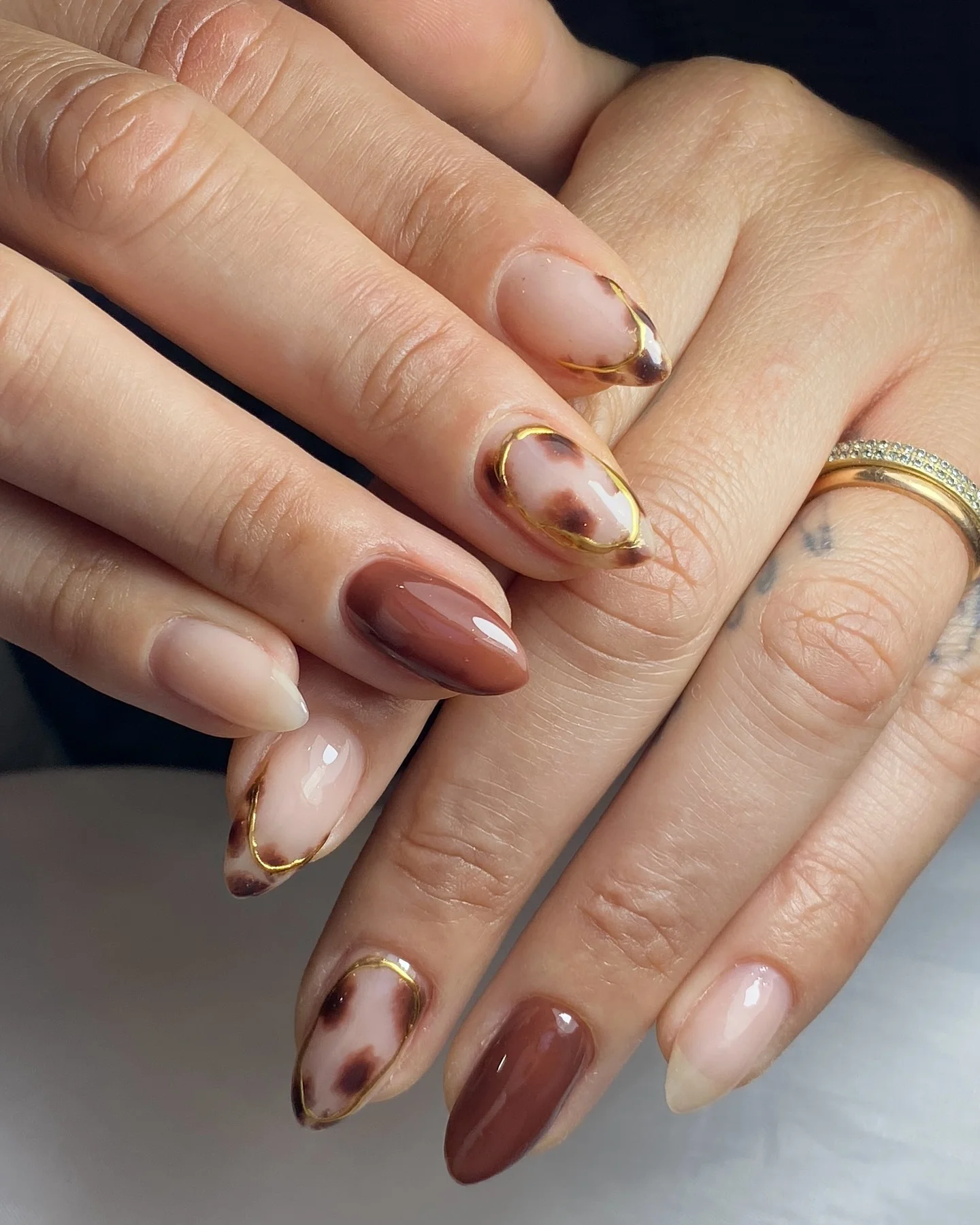 fall almond nails 2026 Golden Mocha Marble With Modern Luxury