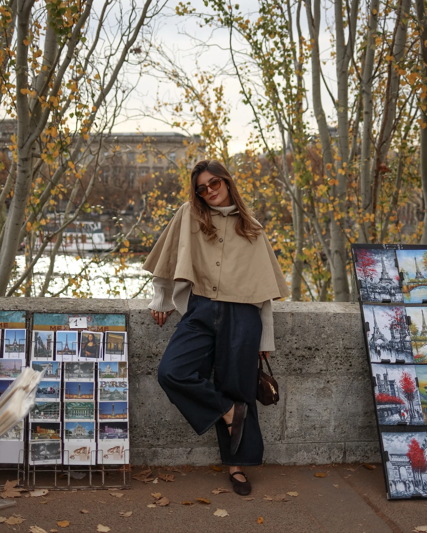 fall poncho outfits 2026 Minimalist Beige Poncho With Dark Wide-Leg Denim