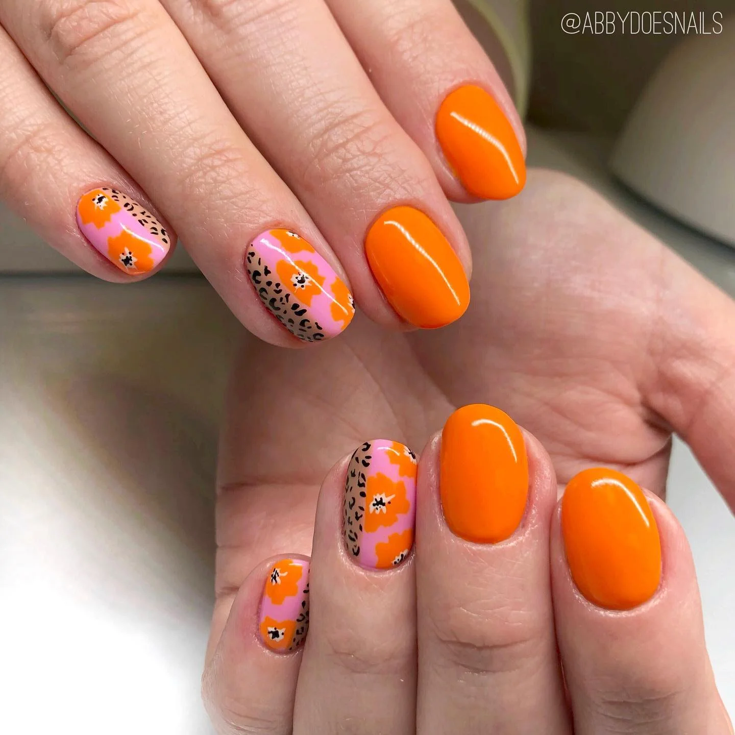 fall short nails 2026 Bright Orange Pop Art Floral Nails