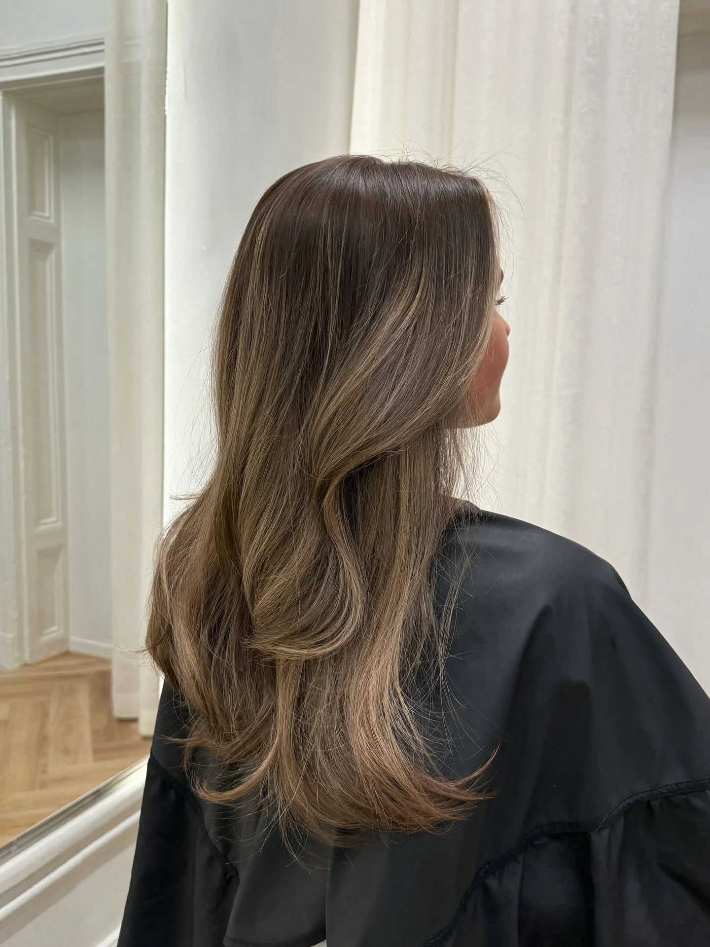 hair lowlights: color ideas and inspiration Glossy Taupe Brunette With Feathered Ends