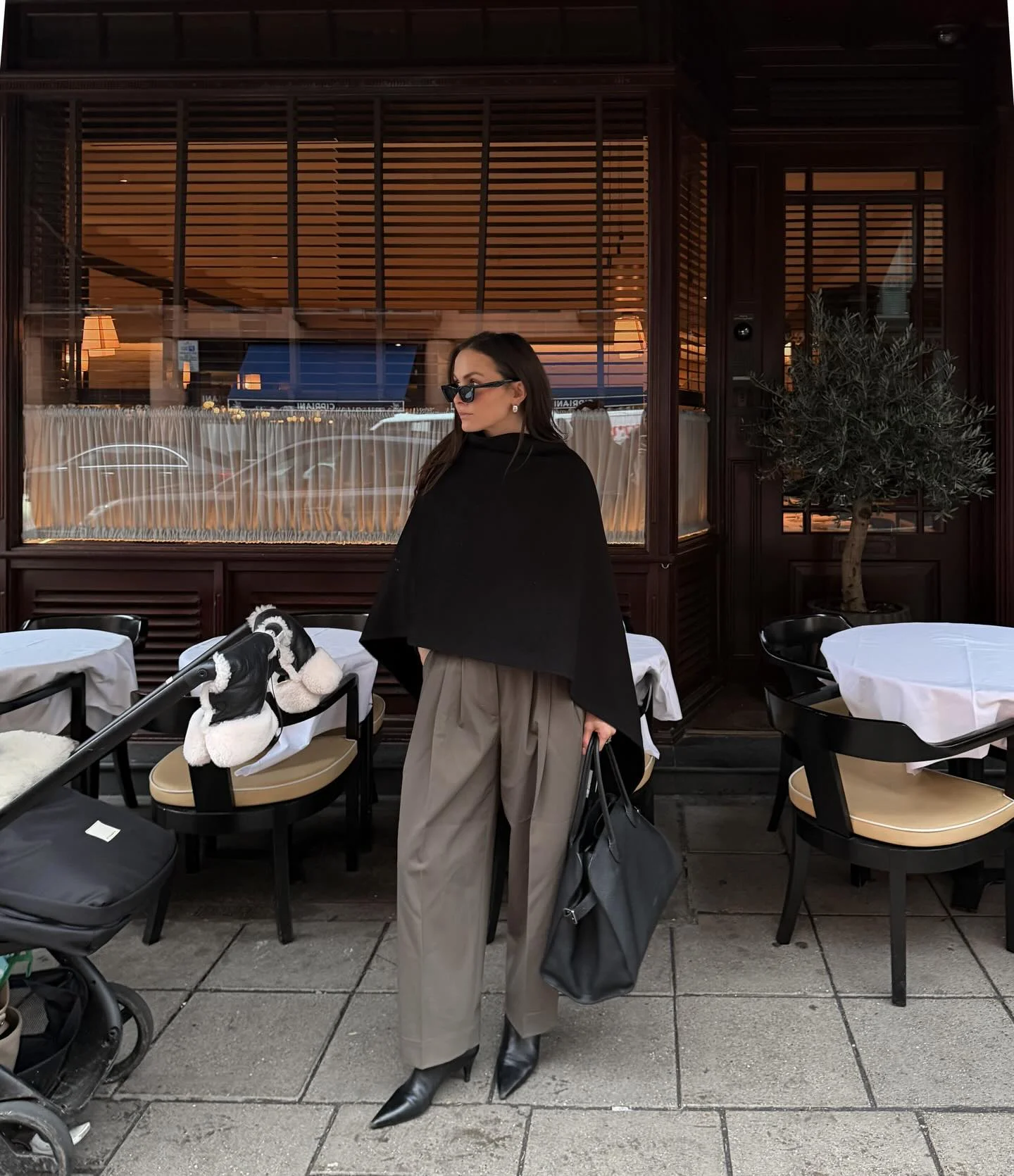 fall poncho outfits 2026 Minimalist Black Poncho With Relaxed Tailored Trousers