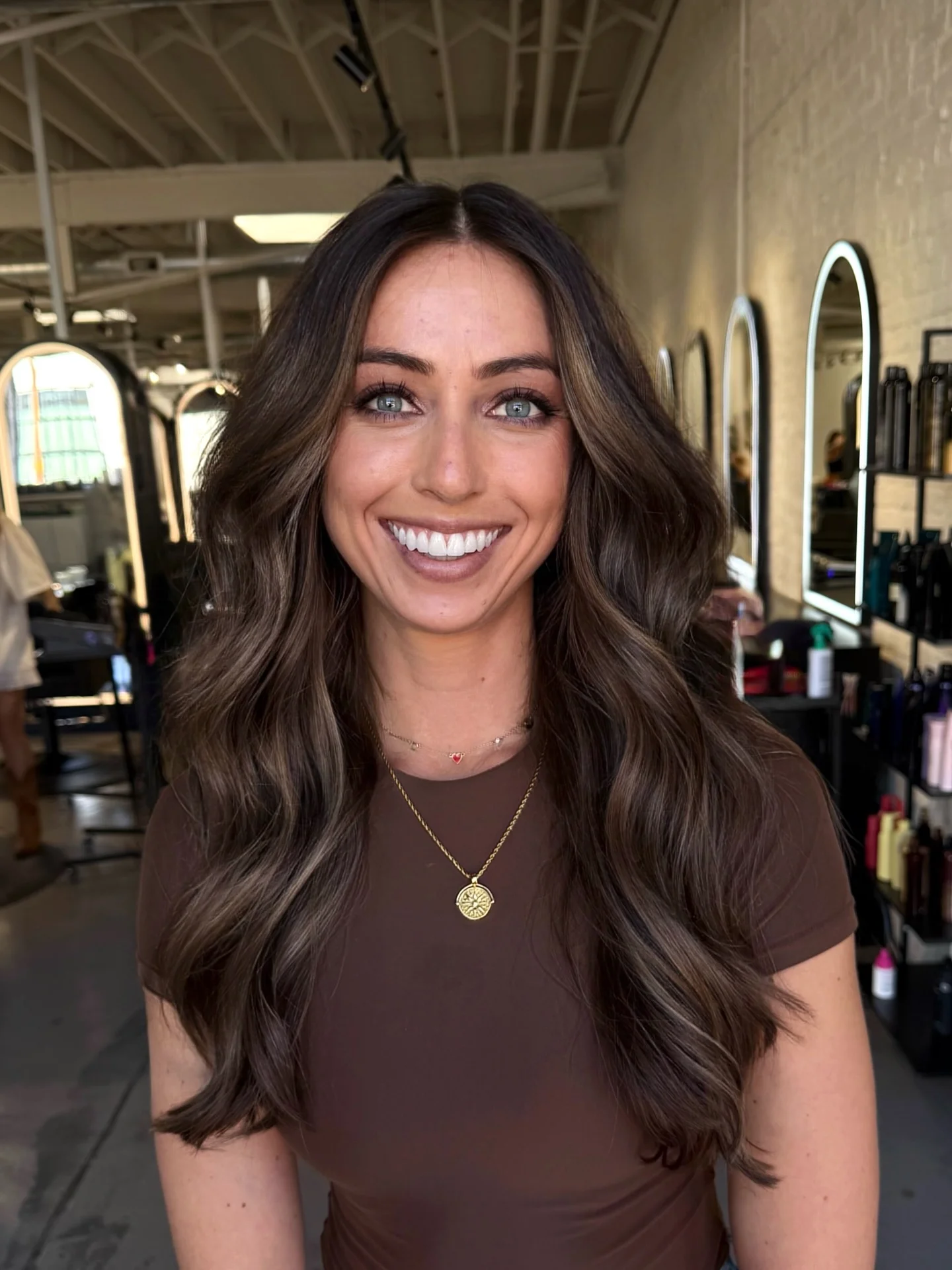 hair lowlights: color ideas and inspiration Rich Chocolate Waves With Soft Face-Framing Dimension