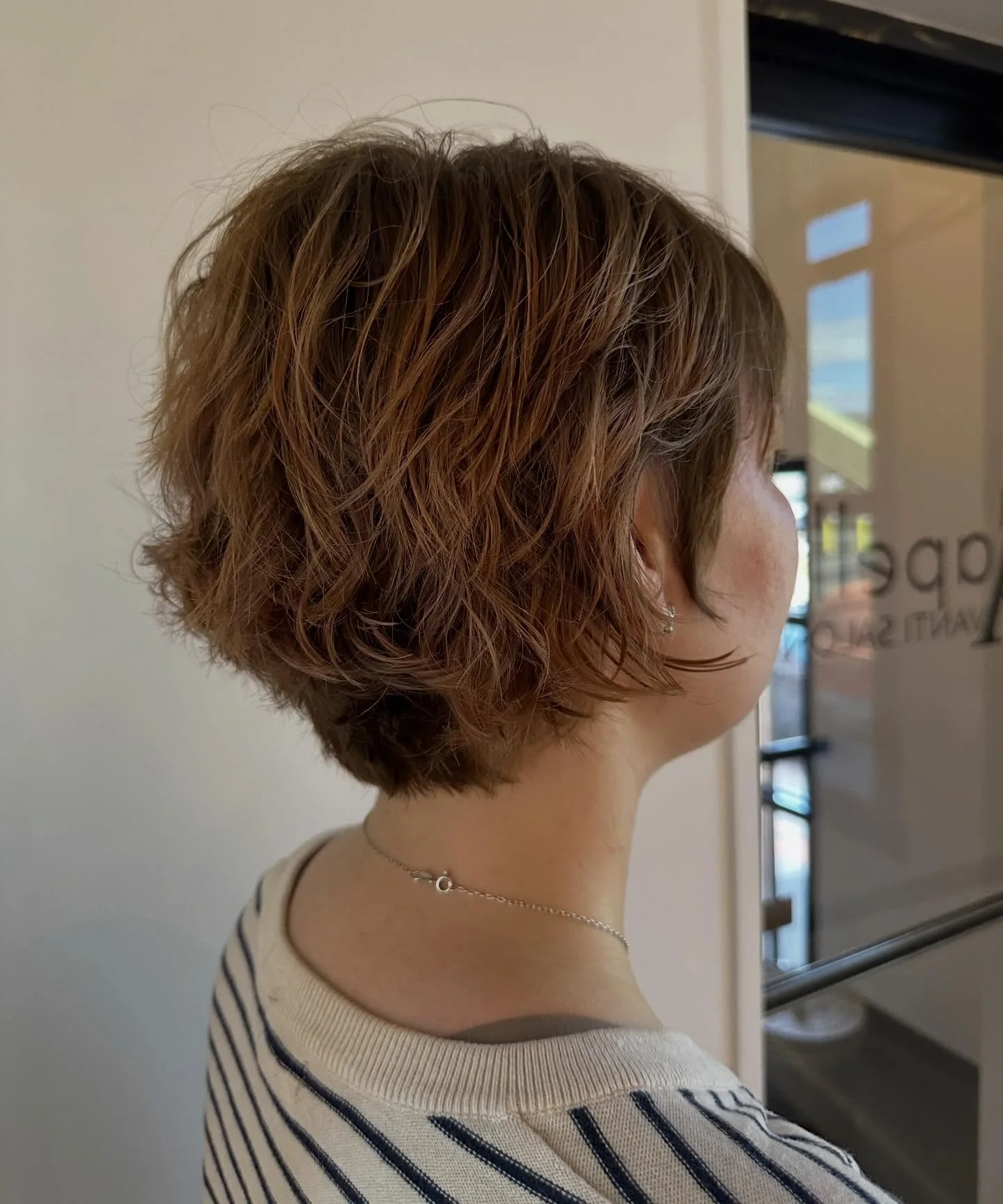 bixie haircut Relaxed Chestnut Wavy Bixie With Natural Texture