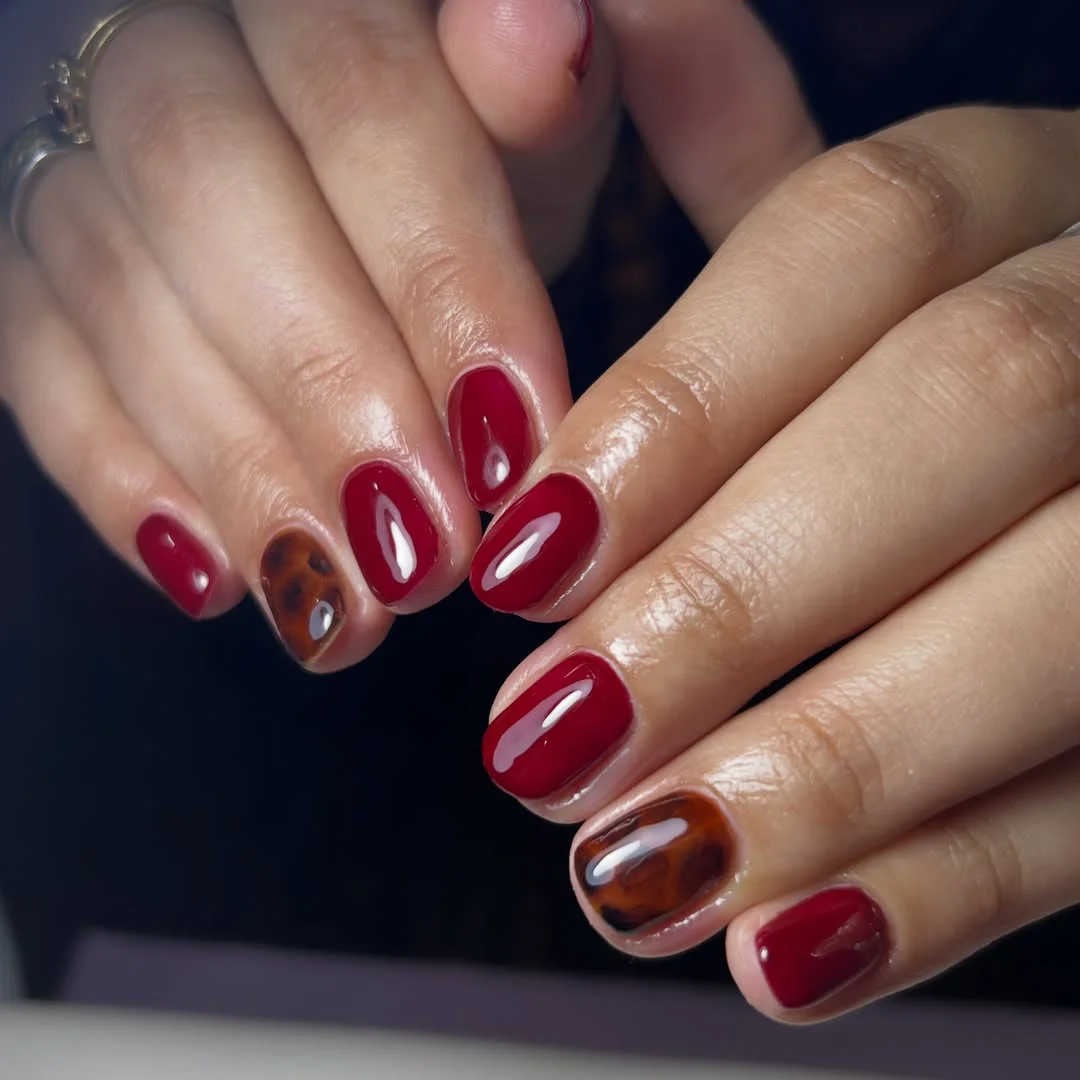 fall red nails 2026 Glossy Cherry Red With Tortoiseshell Accent Nails