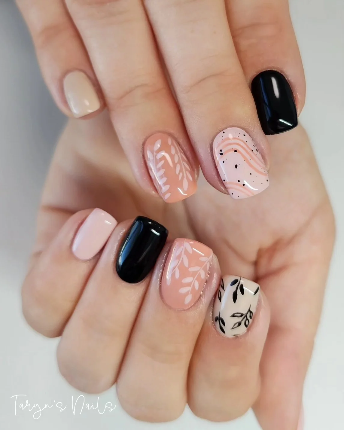 fall short nails 2026 Modern Mixed Autumn Nail Art With Graphic Contrast