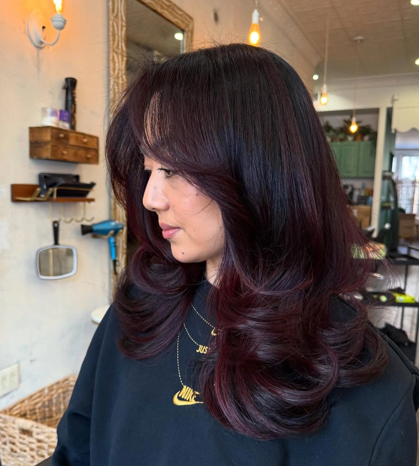 fall hair color ideas 2026 Deep Cherry Espresso With Curtain Bangs