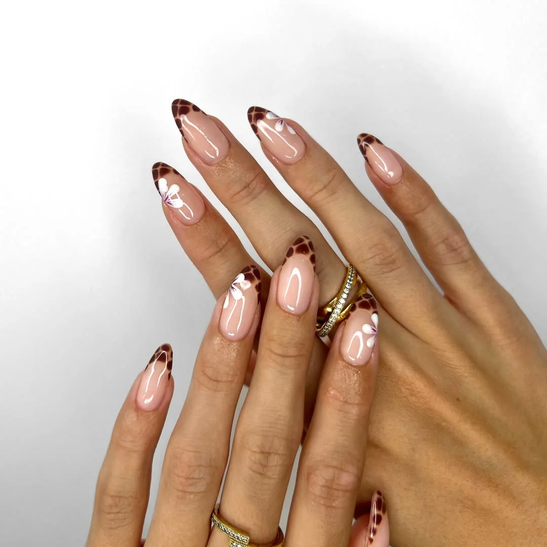 fall almond nails 2026 Tortoiseshell French Tips With Delicate Floral Details