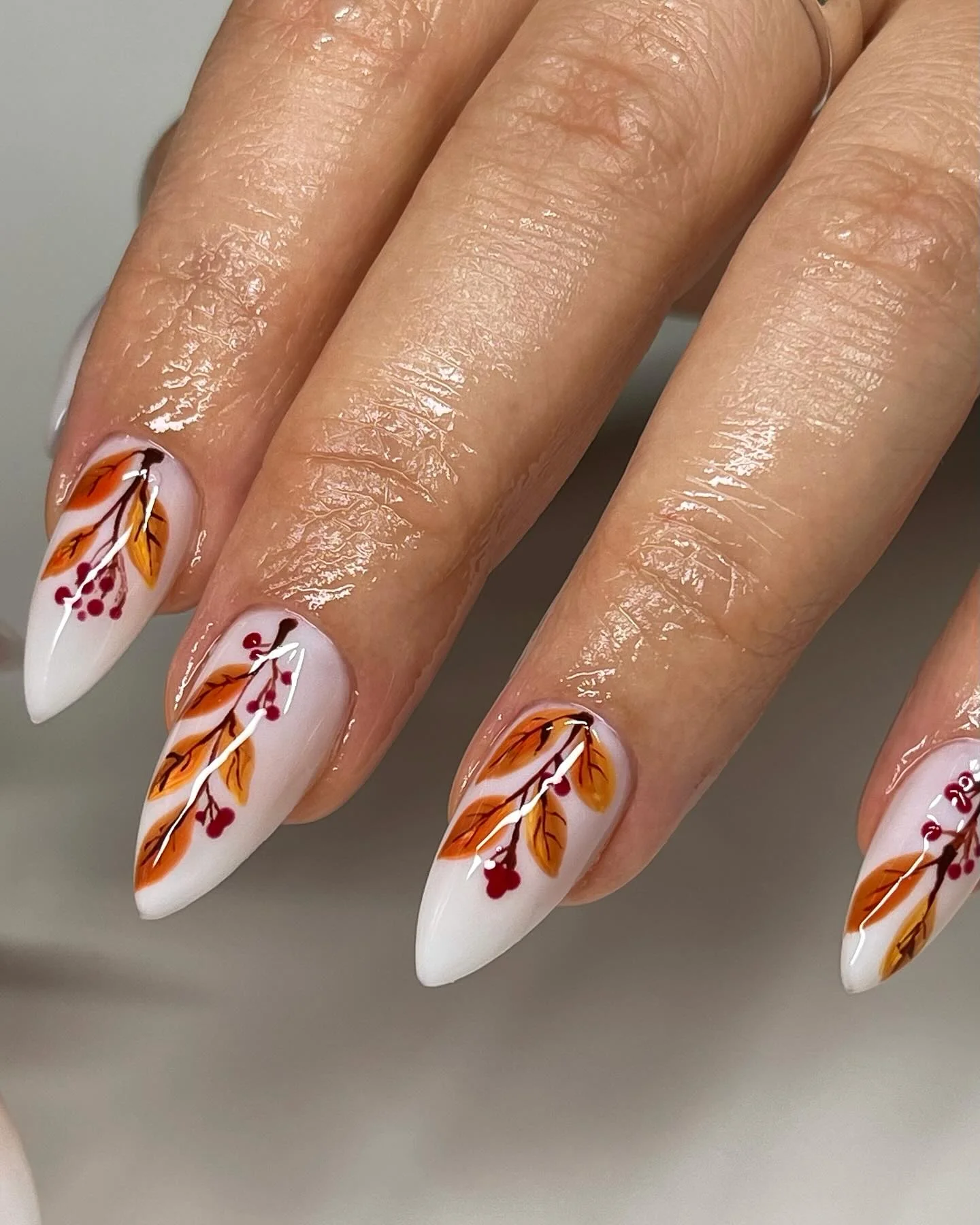 fall manicure 2026 Elegant White Nails With Autumn Leaf Art