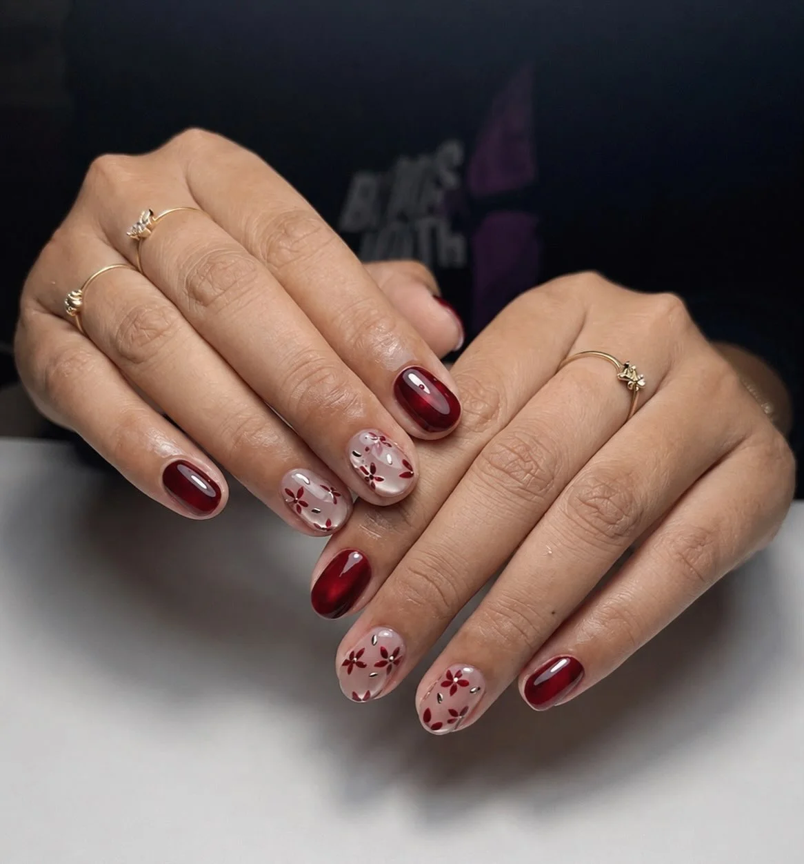 fall red nails 2026 Minimal Floral Burgundy Nails For Everyday Elegance