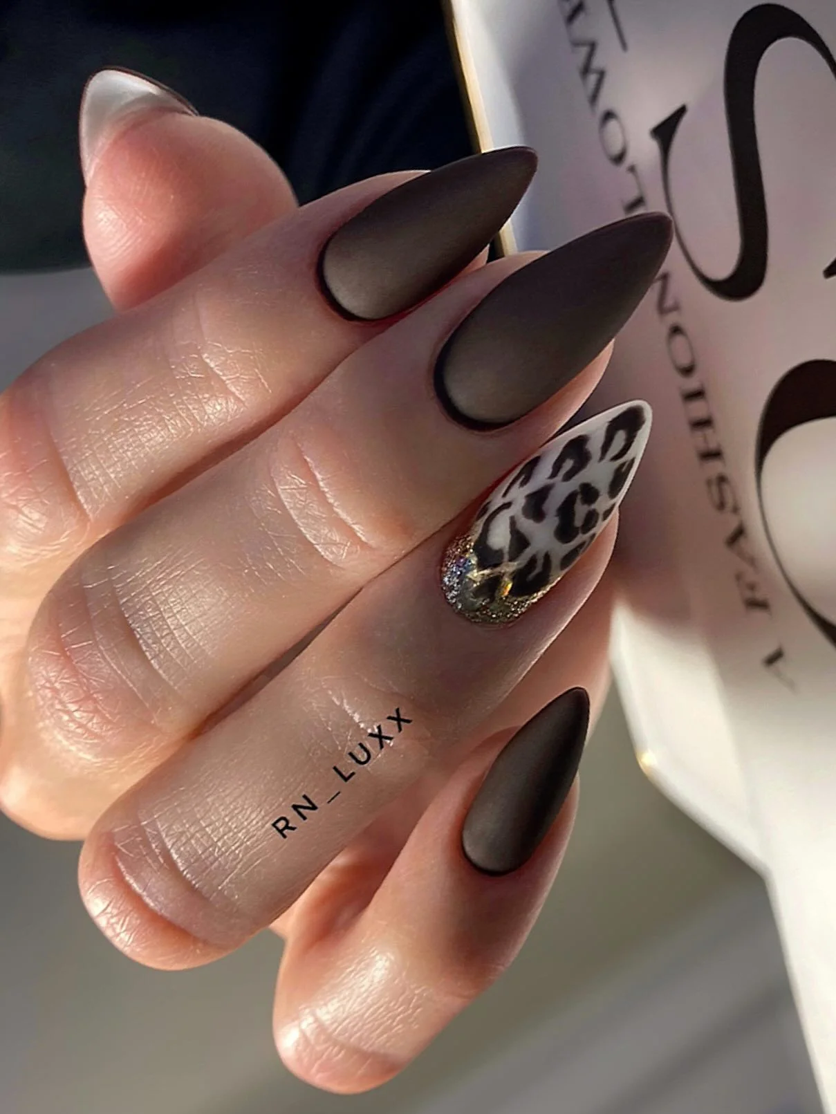 fall dark nail shadow ideas 2026 Matte Espresso Almond Nails With Leopard Accent