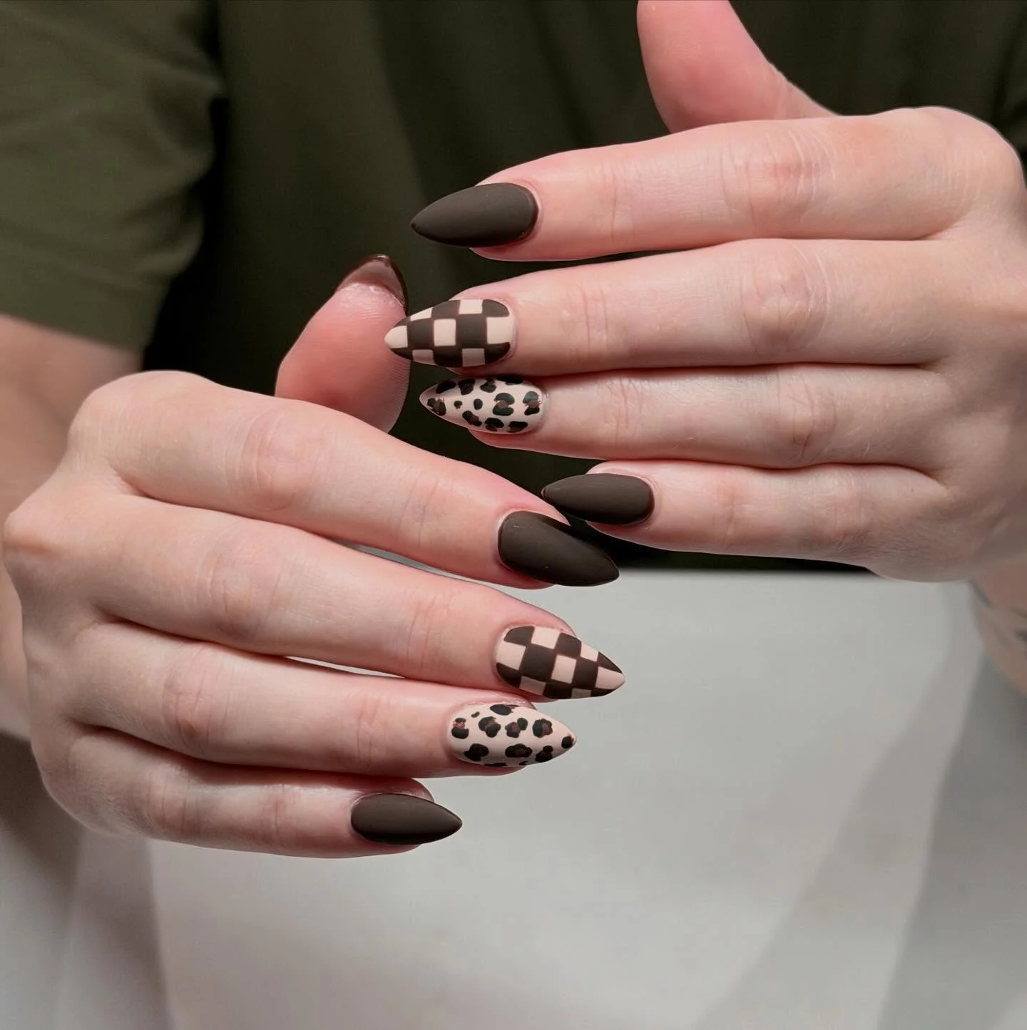fall manicure ideas 2026 Matte Mocha Mix With Checkerboard And Leopard Details