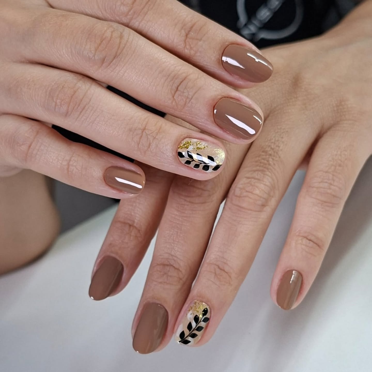 fall manicure ideas 2026 Classic Taupe Nails With Modern Botanical Accent