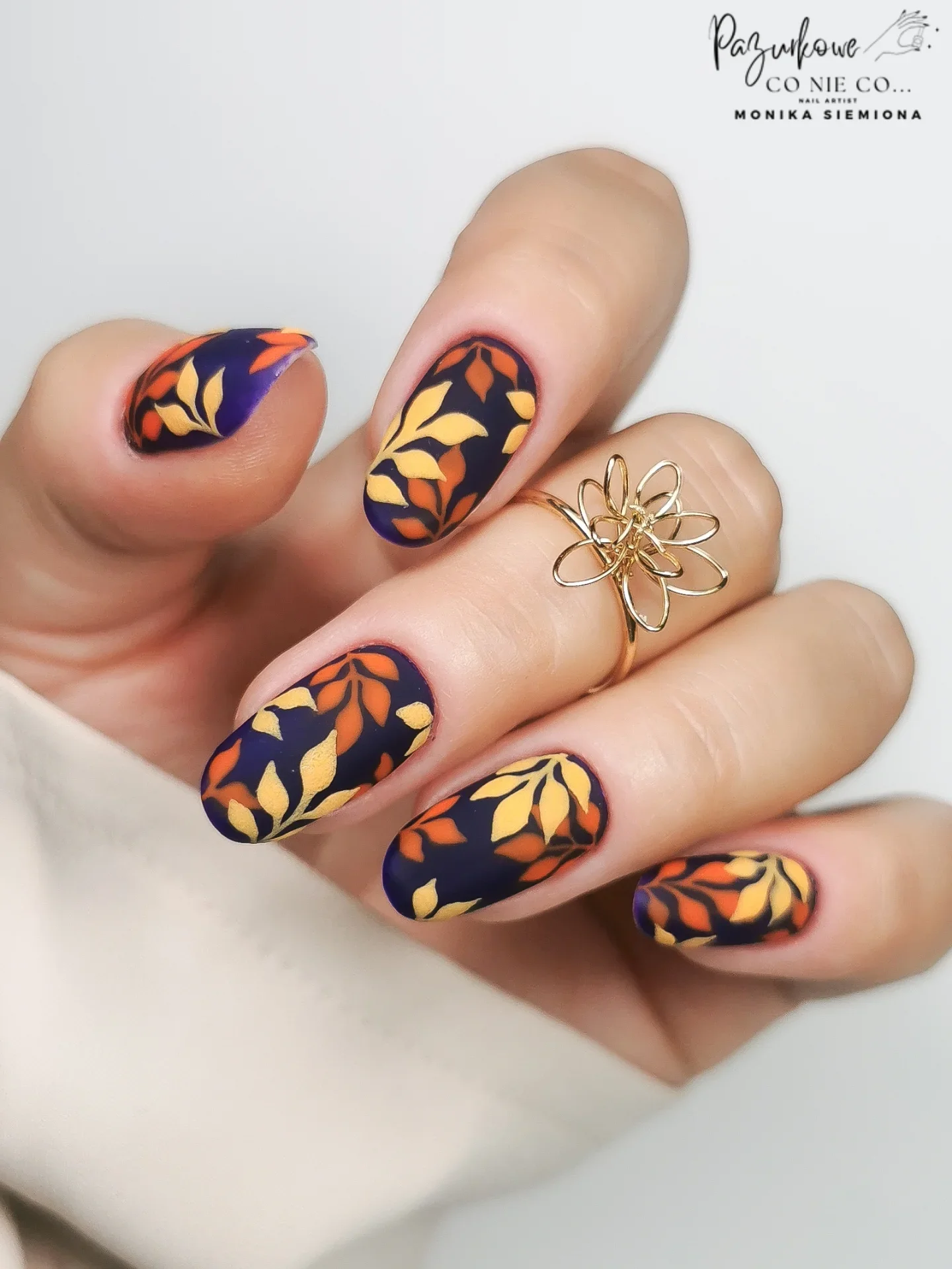 fall nails for pale skin 2026 Midnight Navy With Golden And Burnt Orange Leaves