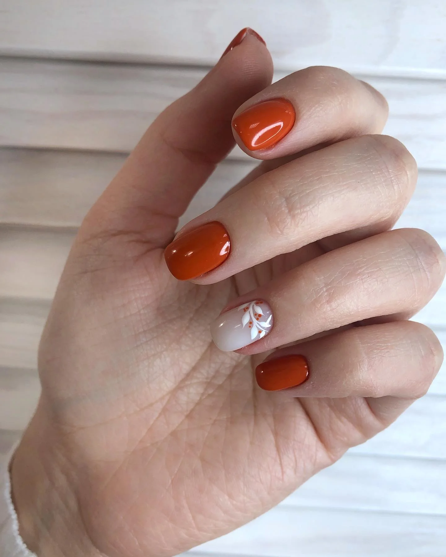 fall nails with autumn designs Glossy Pumpkin Orange With Minimal Leaf Art