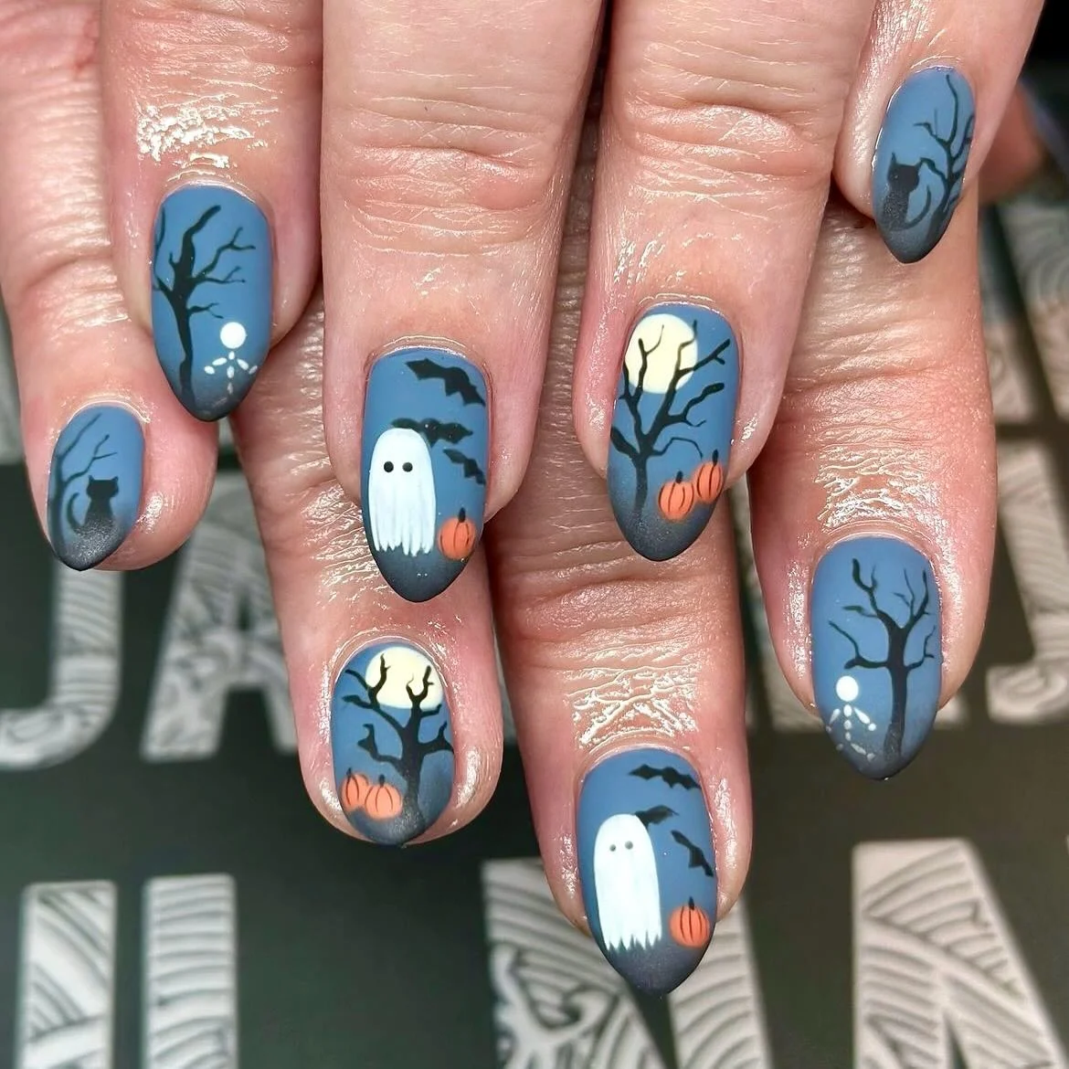halloween nail art 2026 Moody Blue Halloween Nails With Ghosts And Bare Trees
