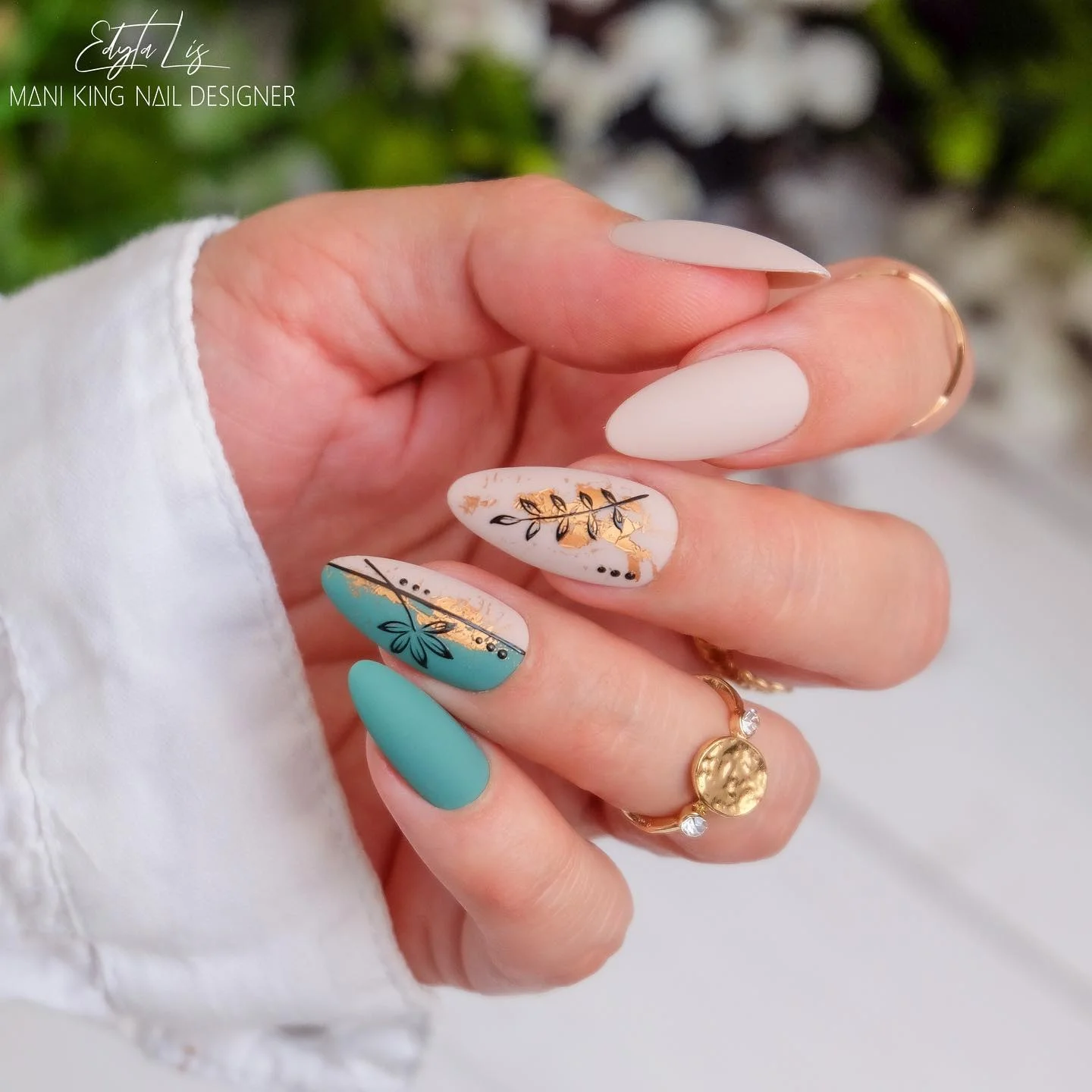 matte fall nails design 2026 Soft White Turquoise And Gold Botanical Details