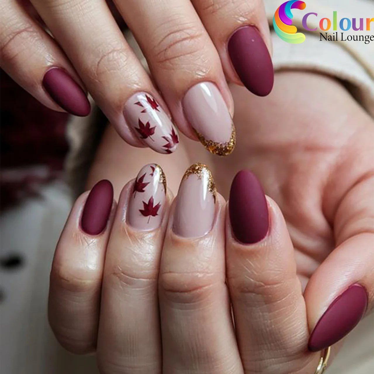 fall gel nails ideas 2026 Matte Burgundy Maple Leaves With Golden French Accents