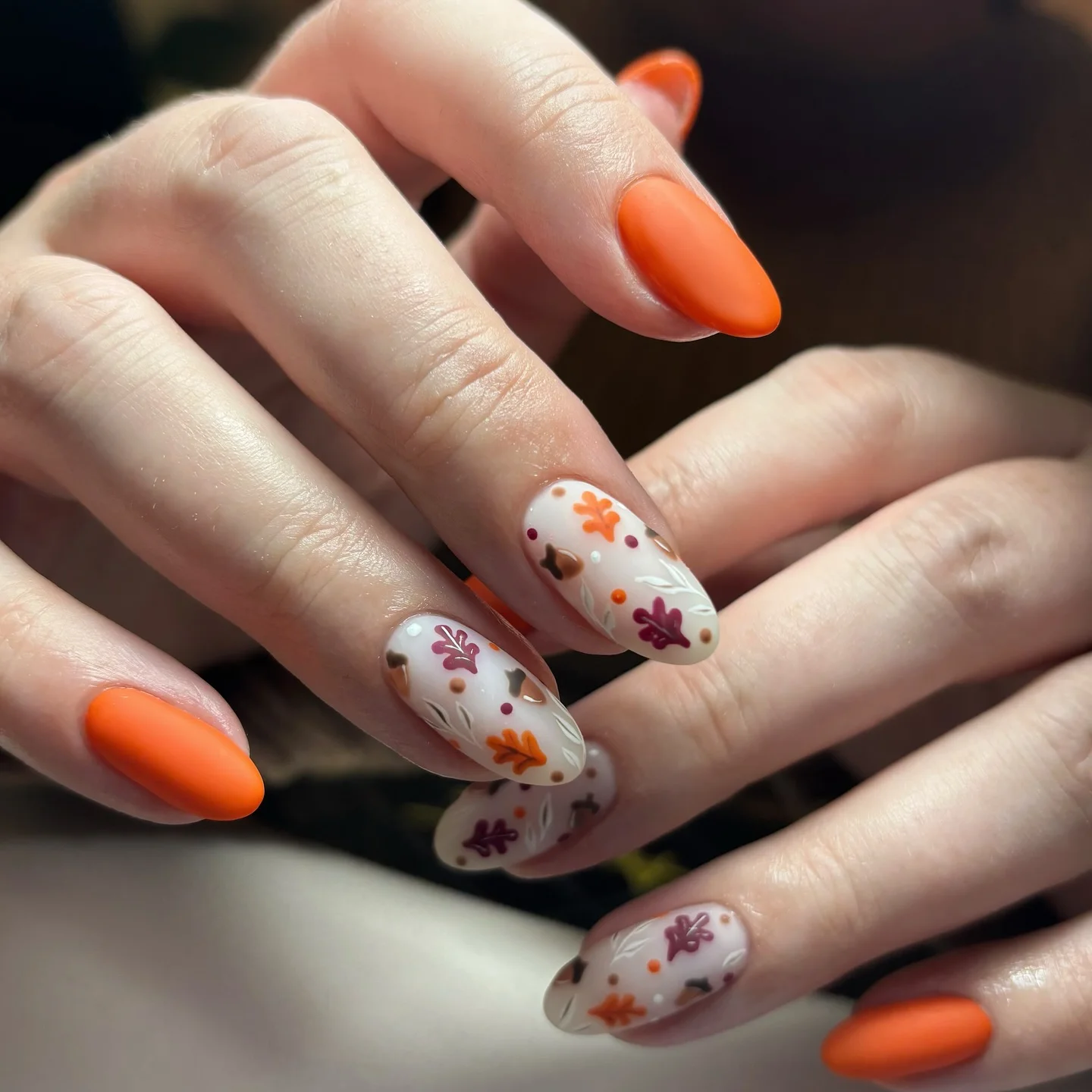 fall medium length nails 2026 Warm Orange Leaves On A Soft Almond Base