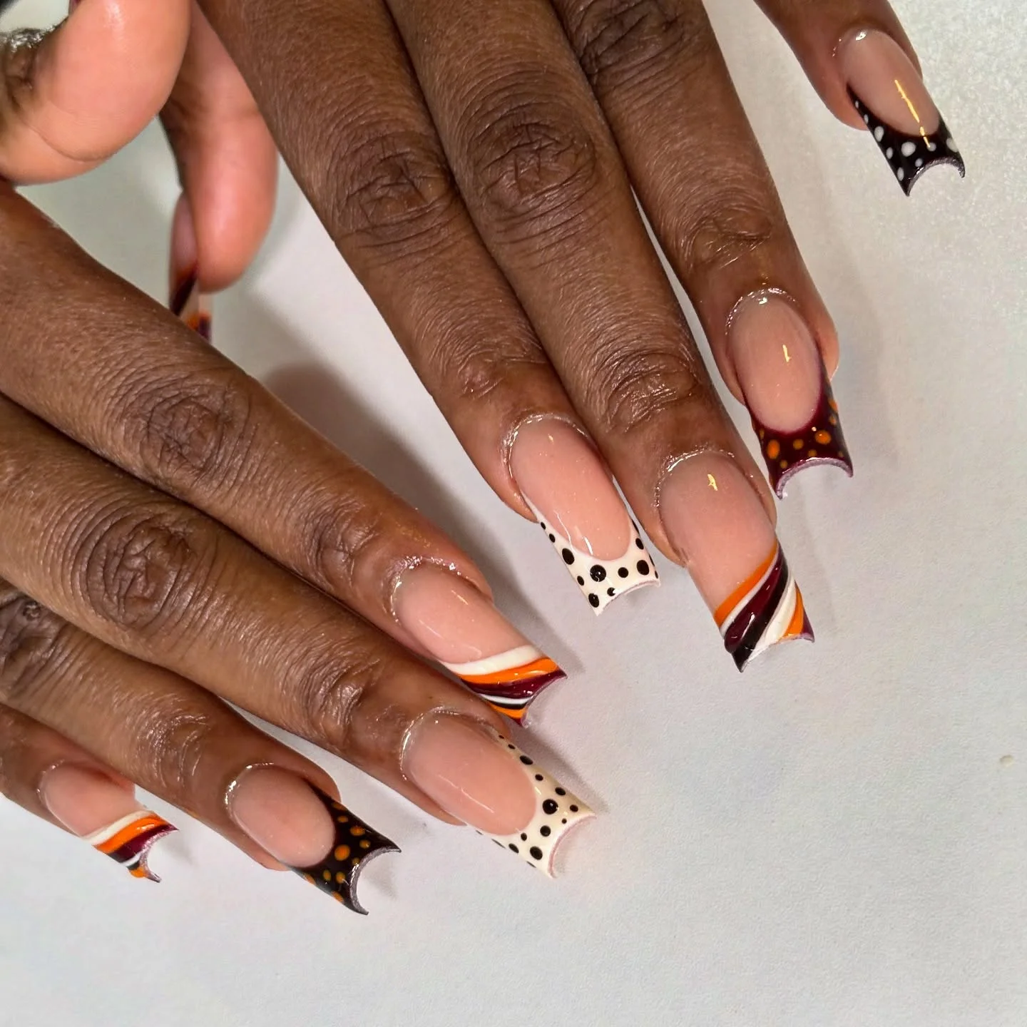 fall nails for brown skin tone Retro Autumn French Tips With Playful Dot Details
