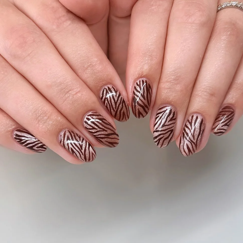fall nails for pale skin 2026 Chocolate Leaf Lines On A Rosy Neutral Base