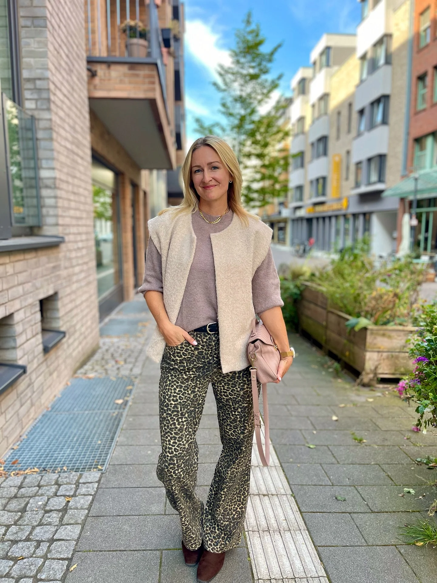 september fashion trends 2026 Soft Neutrals With Leopard Print Trousers