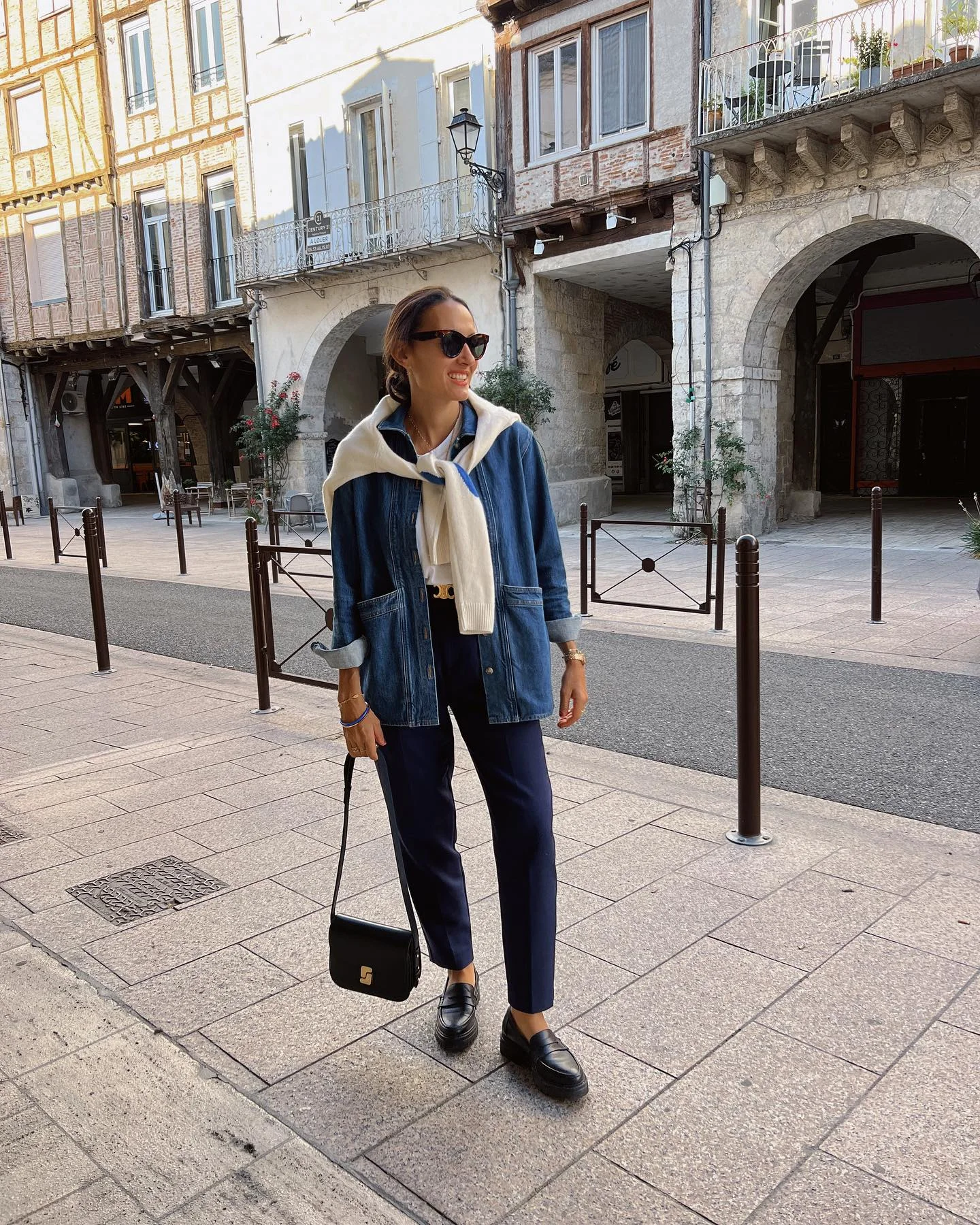 september outfit ideas 2026 Denim Jacket With Navy Trousers And A Cream Sweater