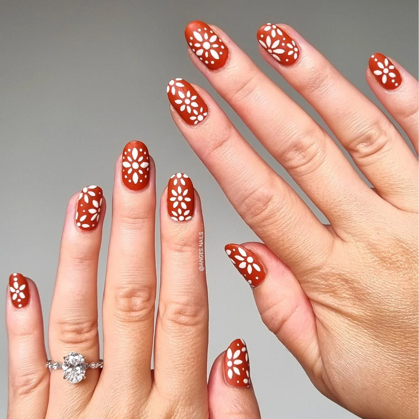 fall matte nails 2026 Terracotta Red With Vintage White Floral Details