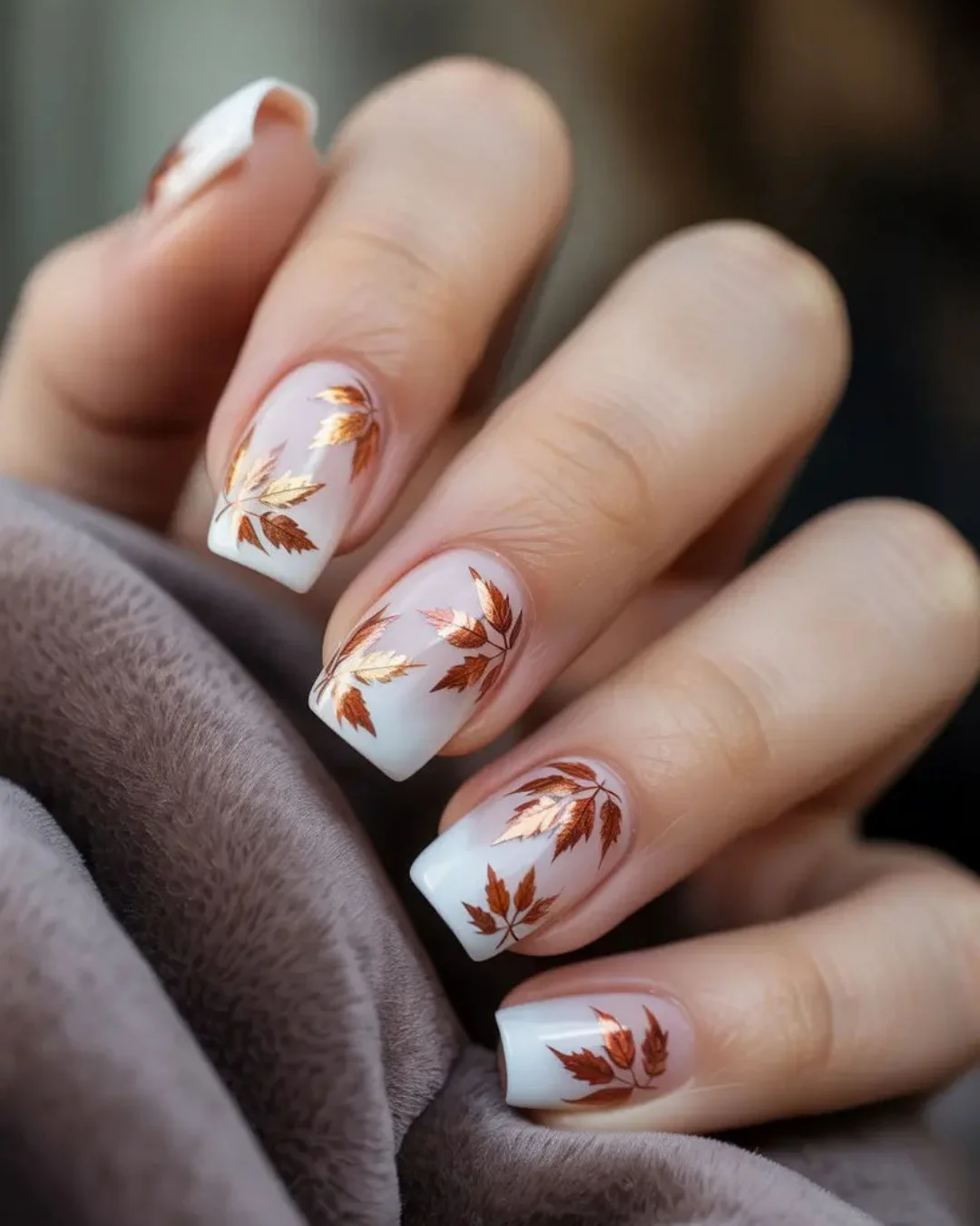 fall medium length nails 2026 Autumn Leaf Art With A Milky White Finish