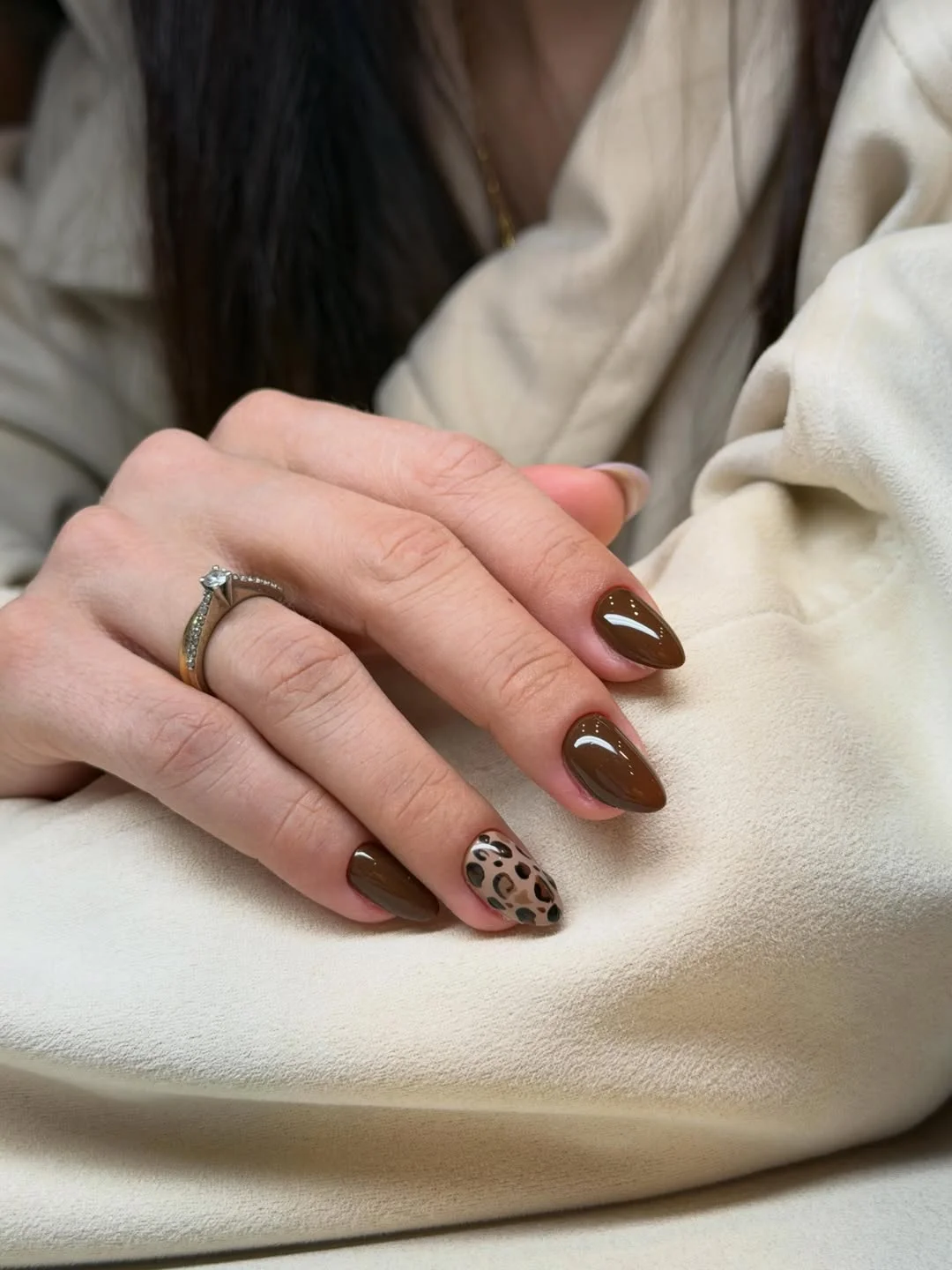 fall nail trends 2026 Chocolate Brown Almond Nails With Chic Leopard Accent