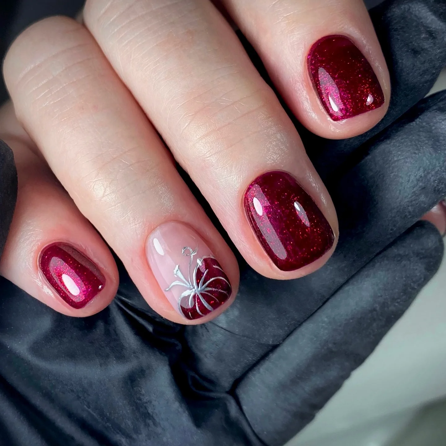 fall nails for pale skin 2026 Berry Burgundy Glitter With Delicate White Florals